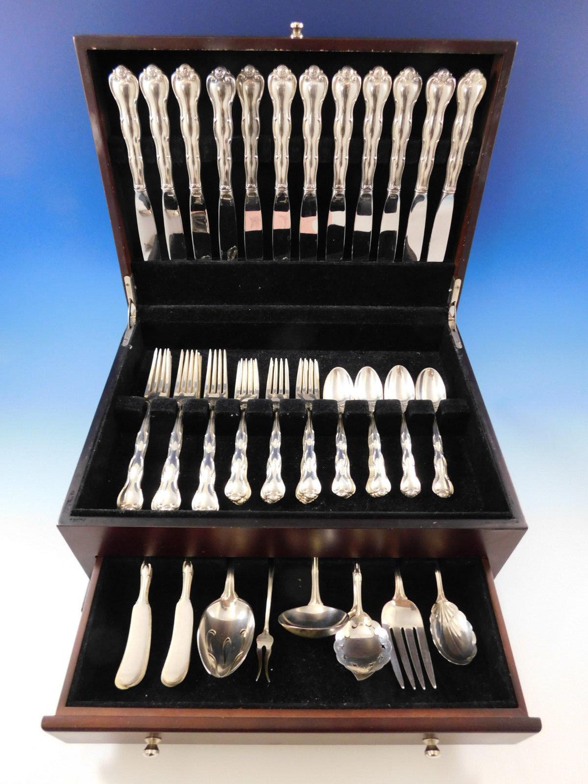 Dinner size Rondo by Gorham sterling silver flatware set, 68 pieces. This set includes:

12 dinner size knives, 9 5/8