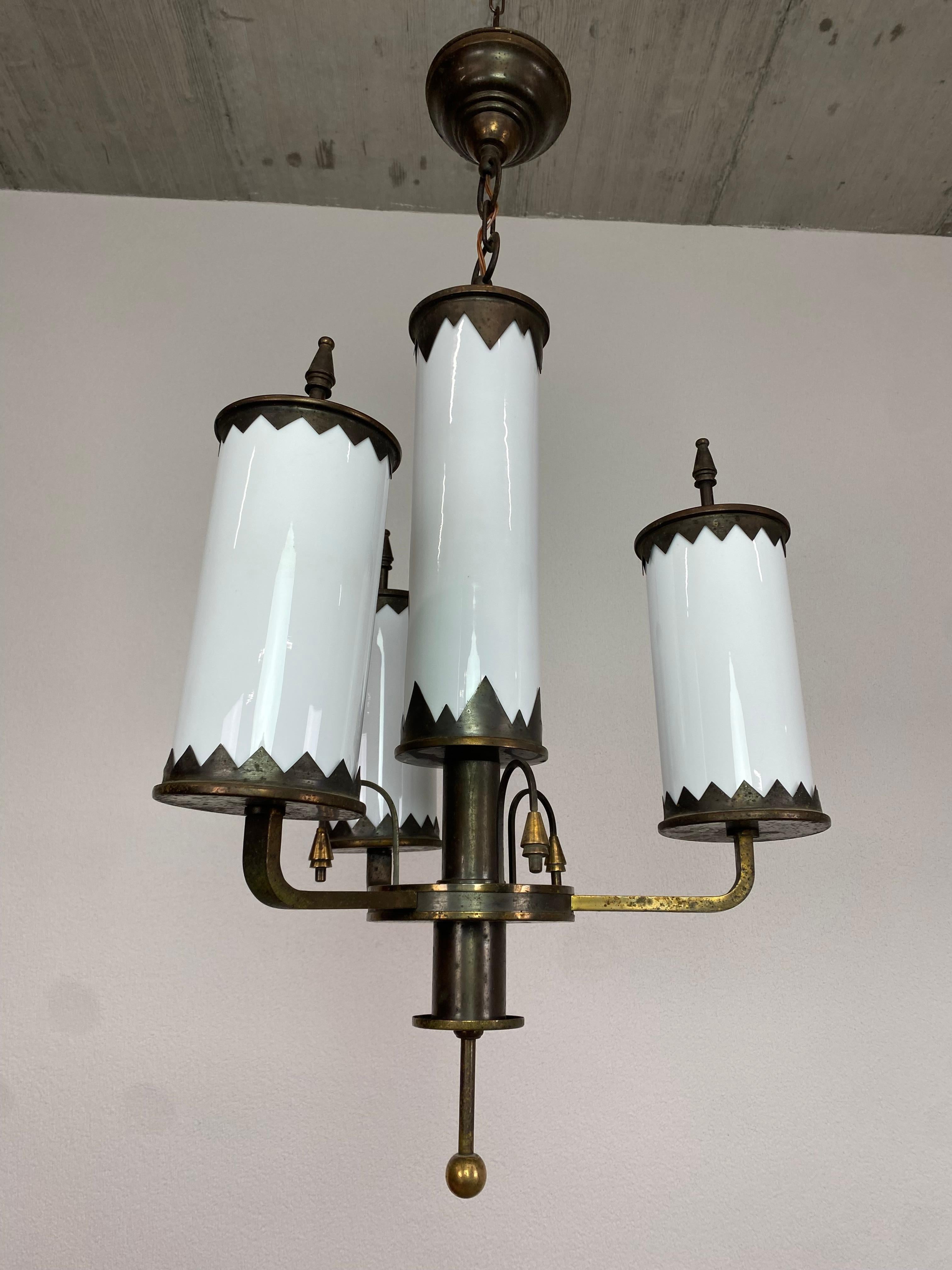 Rondocubist art deco brass hanging lamp with white glass lampshades.