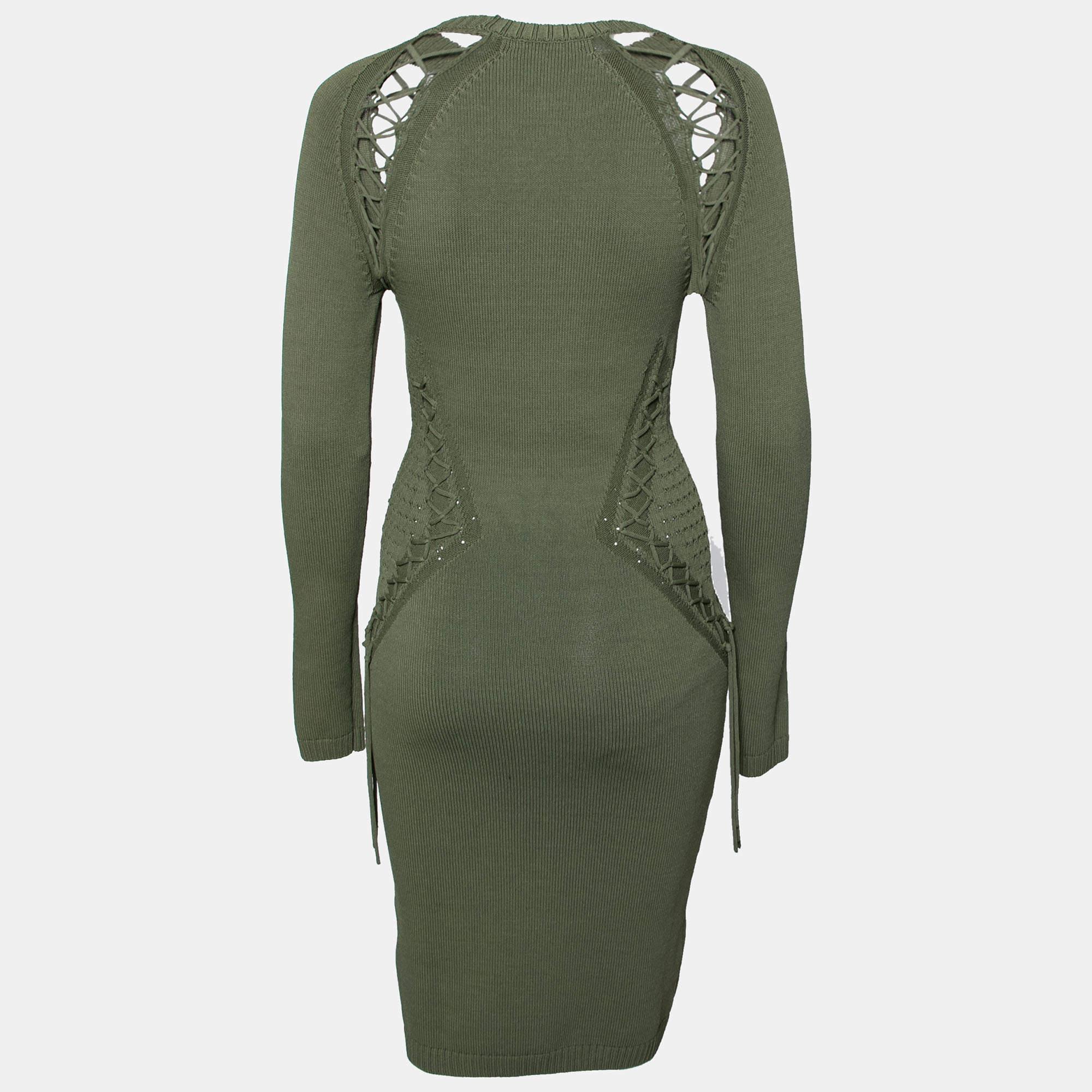 With a stand out design this Ronny Kobo dress embodies a high fashion appeal. Tailored from knit fabrics it is styled with trendy cut outs long sleeves and lace detailing. The fitted silhouette of the dress will perfectly illuminate your body.