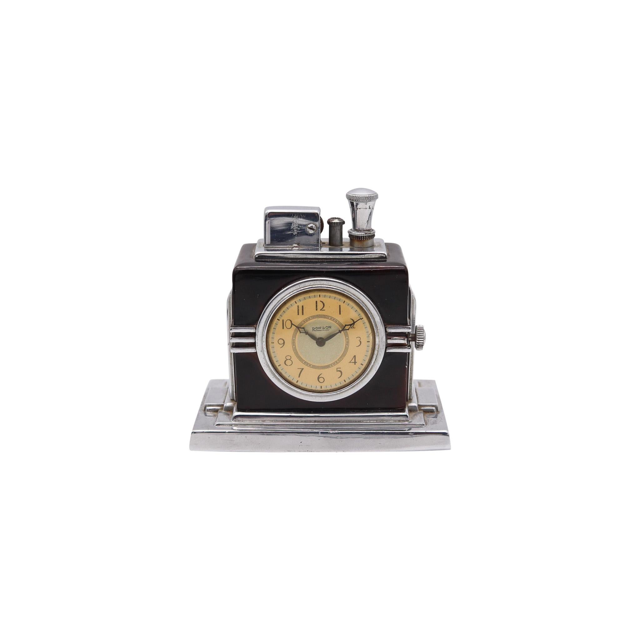 A Maltese clock & touch tip lighter designed by Ronson.

This is an extremely rare Ronson Maltese clock Touch-Tip lighter. This is a very iconic piece made in 1936 at Newark, New Jersey in the United States by the Ronson Art Metal Works Inc. This