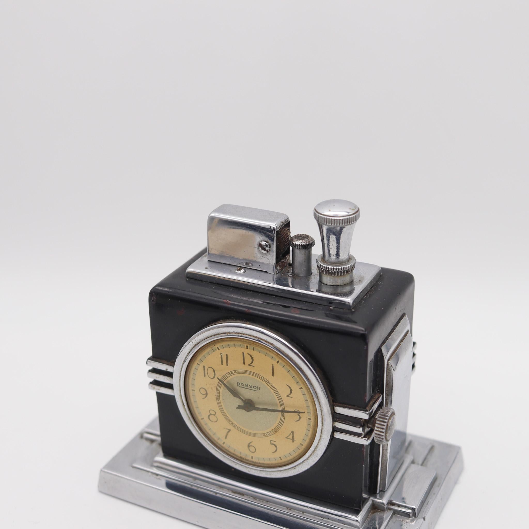 Ronson 1936 Malteser Art Deco Machine Age Schwarz Uhr mit Touch Tip Lighter (Art déco) im Angebot