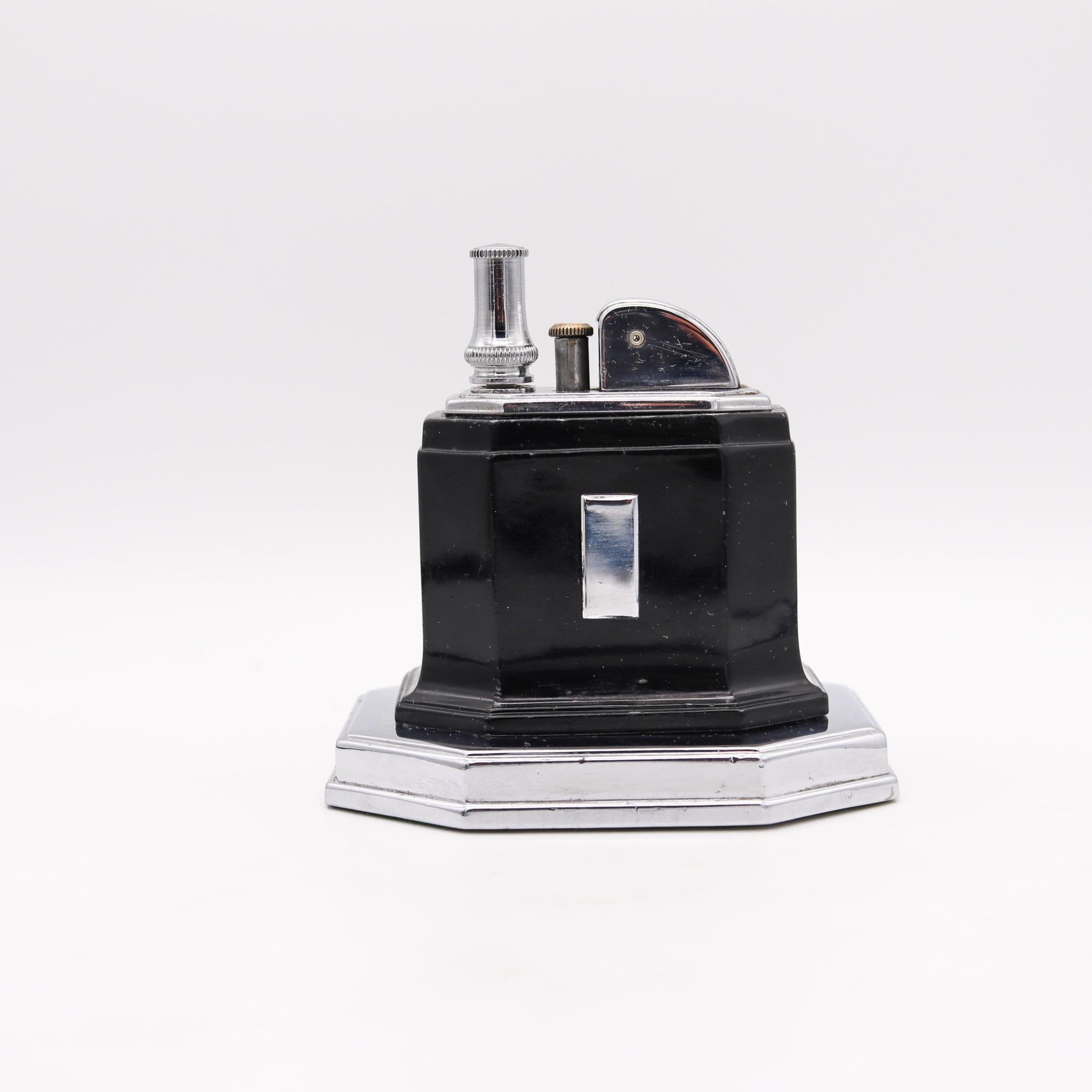 A desk lighter designed by Ronson.

This Ronson Touch-Tip Octette table lighter was made between 1935 and 1951 by the Ronson Art Metal Works Inc. located in Newark, New Jersey in the United States. This lighter began a very successful era for