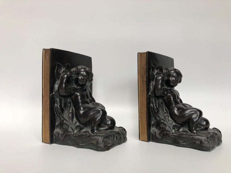 Molded Ronson Pair of Art Deco Bookends For Sale