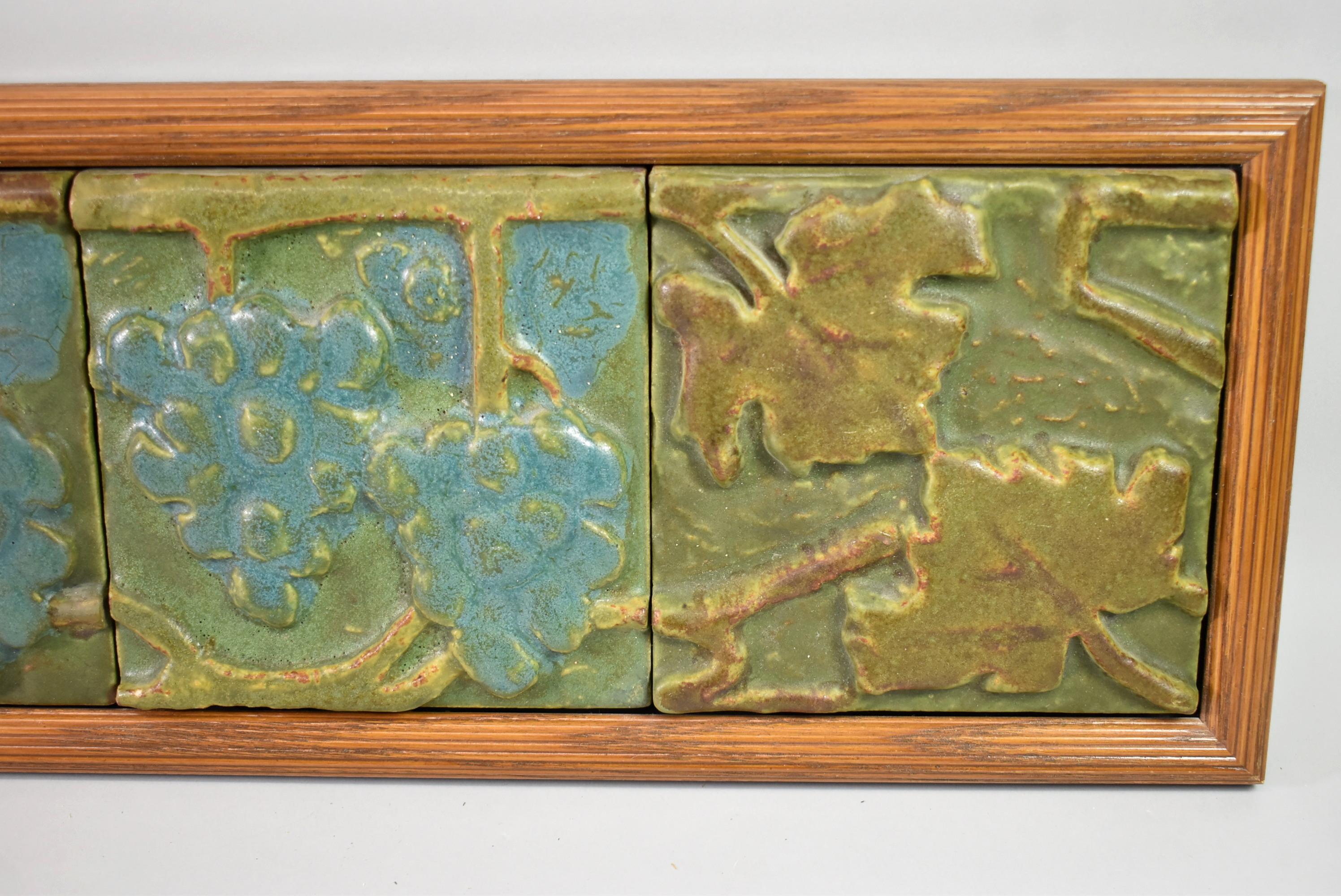 These four Rookwood Arts & Crafts Grape Tiles are framed with a grape and leaf motif. Each tile is 6