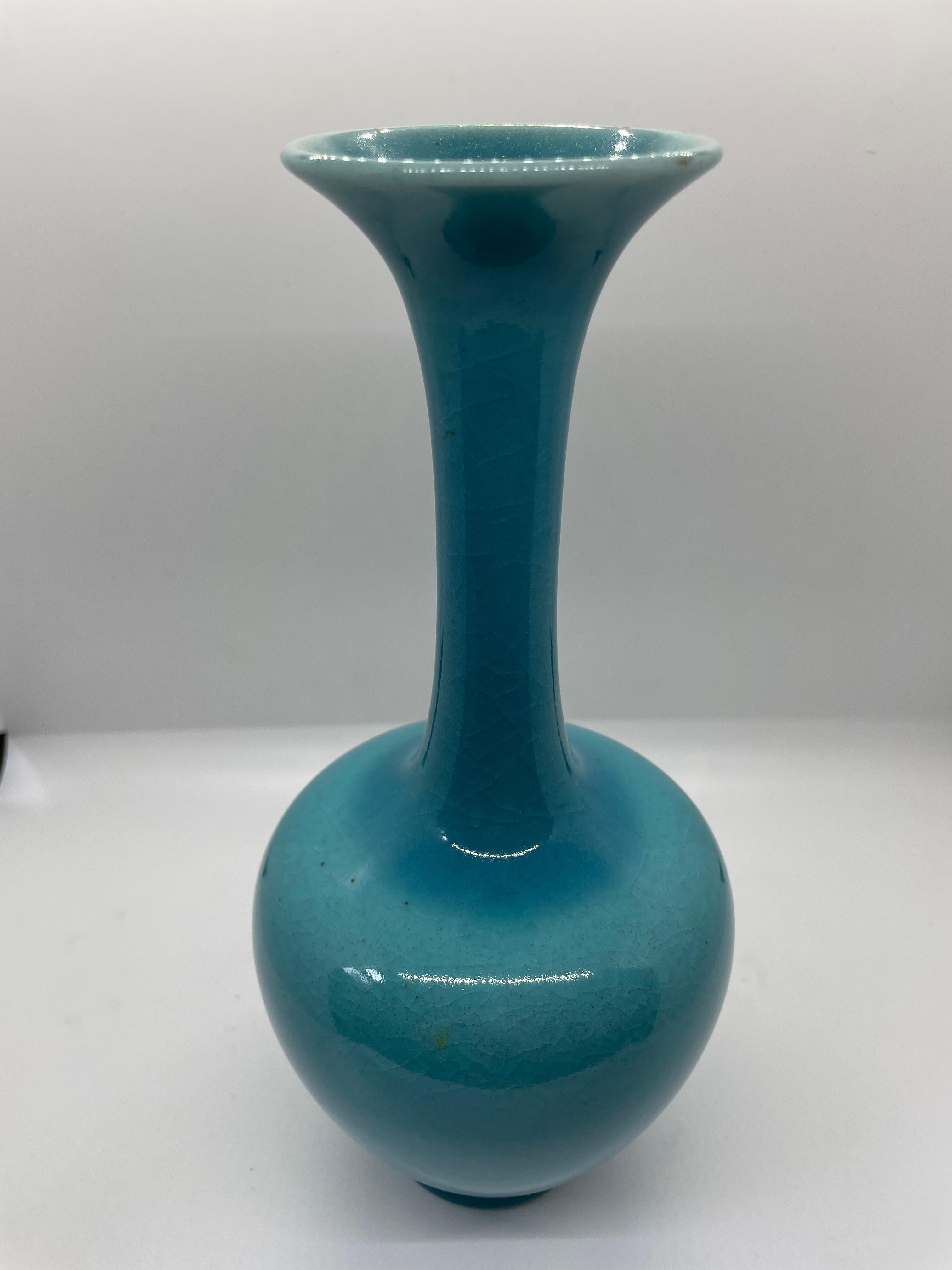 Gorgeous shade of blue on this form number 778 Rookwood Pottery vase circa 1942. Really cool all over craquelure (see video). Some spots of unknown origin do not detract but instead add to the vintage appeal of this vintage beauty! Art pottery is a