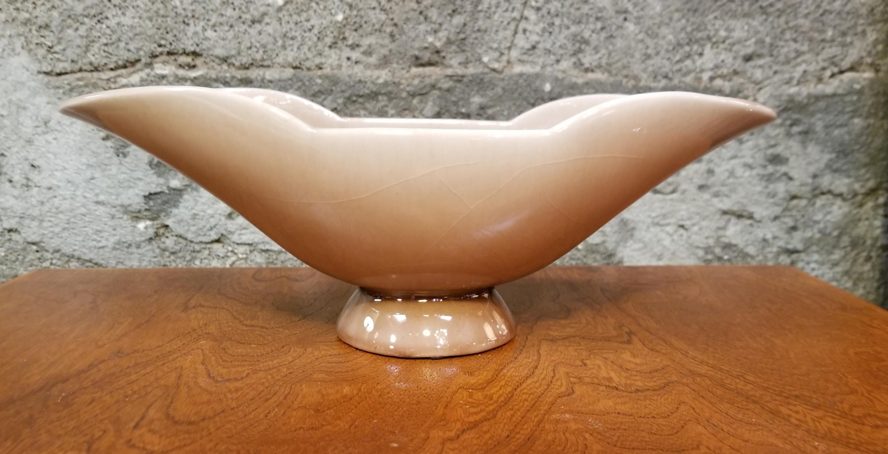 Art pottery ceramic center bowl or vase by Rookwood Pottery Company, dated 1946. Signed and dated on base.

Rookwood Pottery Company:

Rookwood Pottery is known for having many women artists on staff over its long lifespan. It has the