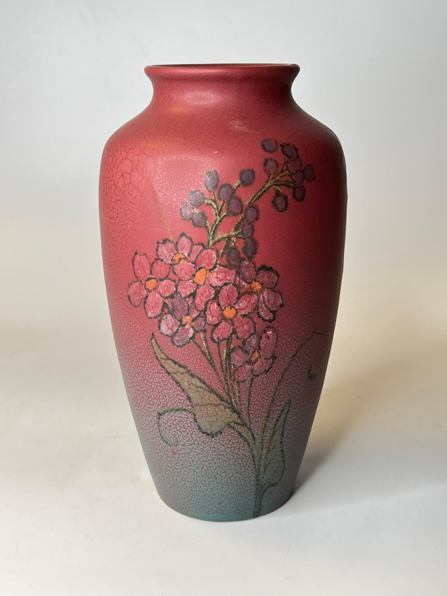 Our Rookwood vase, dated 1922, was designed by Margaret Helen McDonald (1913-1948) and is signed with her monogram.

The artist was the daughter of the famous Rookwood artist, William McDonald. She joined her father at the firm to decorate objects