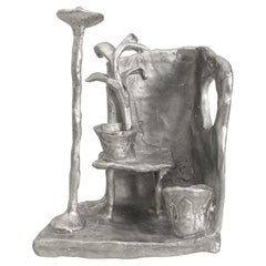 Handmade Aluminium cast sculptural candle holder depicting "Room at Night"