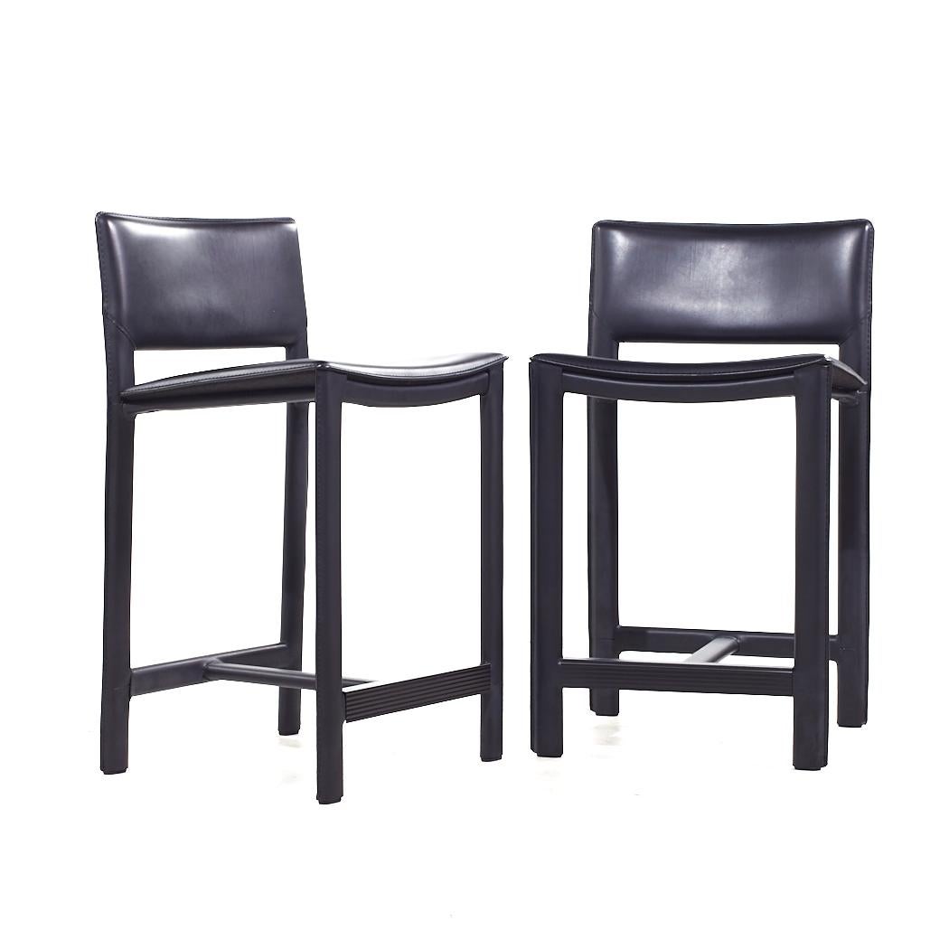Room & Board Madrid Contemporary Leather Wrapped Bar Stools - Pair

Each barstool measures: 18.25 wide x 16 deep x 32.75 high, with a seat height of 23.75 inches

About Photos: We take our photos in a controlled lighting studio to show as much