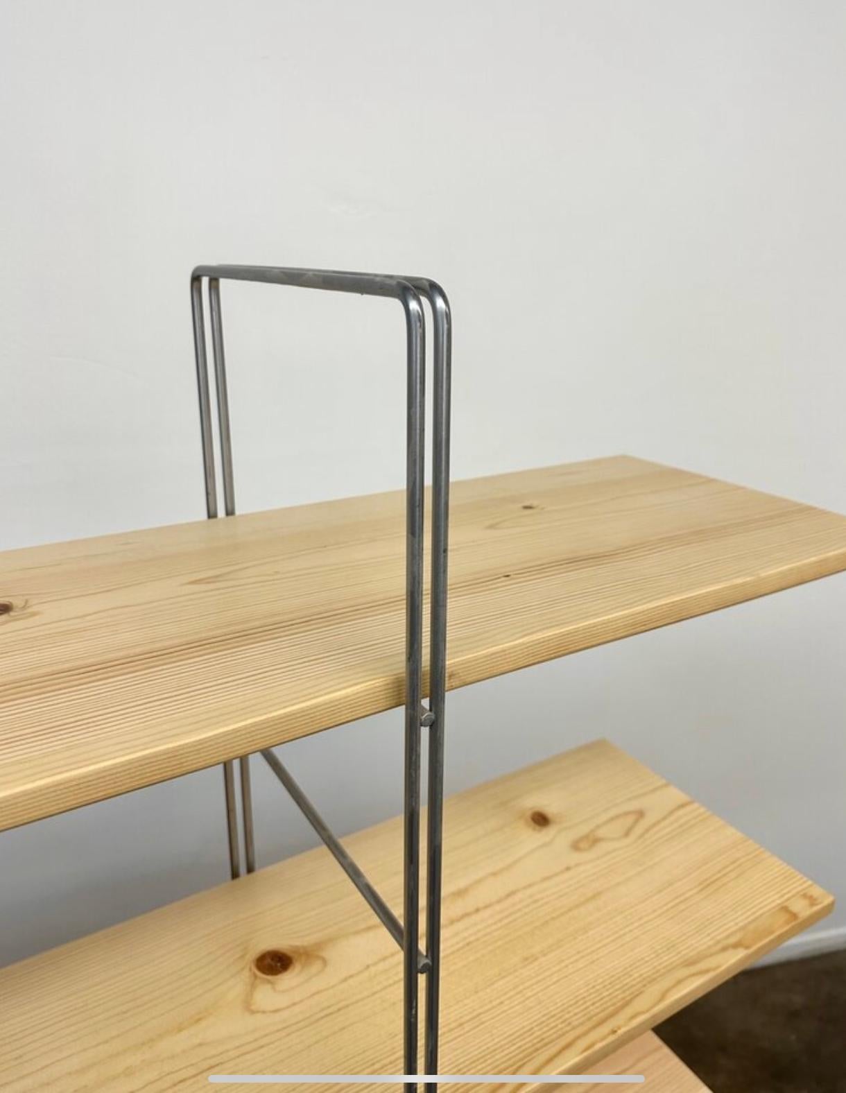 Measures:W67 D13 H63 BETWEEN SHELVES 13

Room divider /bookcase by Niels Gammelgaard for Ikea circa 1980s reworked by Vintage on Point. Item shows well and now has new solid wood shelves.