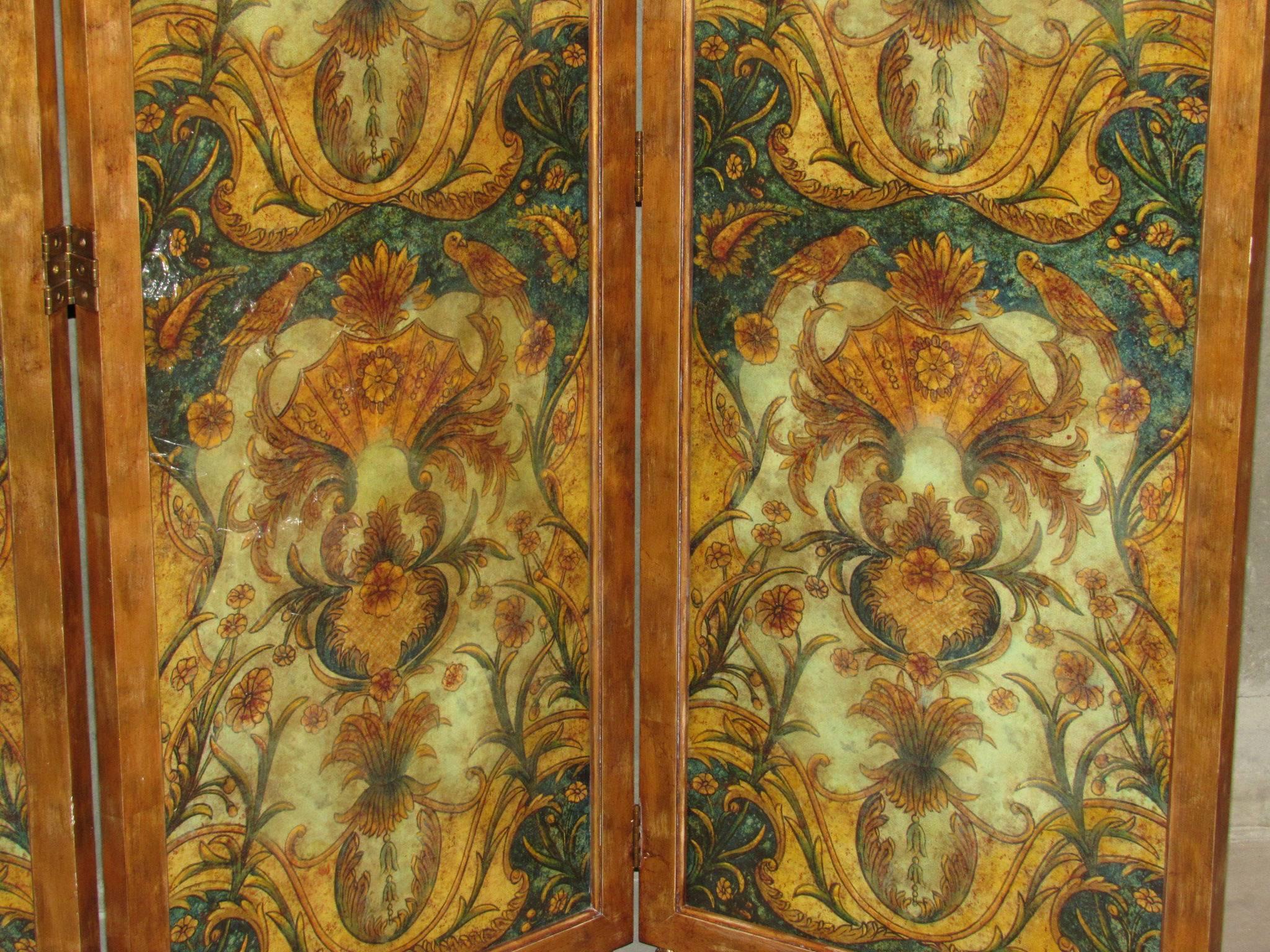 Room divider screen by Maitland-Smith 1990s.  Six panels, three and three that can be joined.  Mahogany gilded frames with painted glass inserts.  Each panel sits on two gold feet, making the screen appear to float just slightly off the ground.