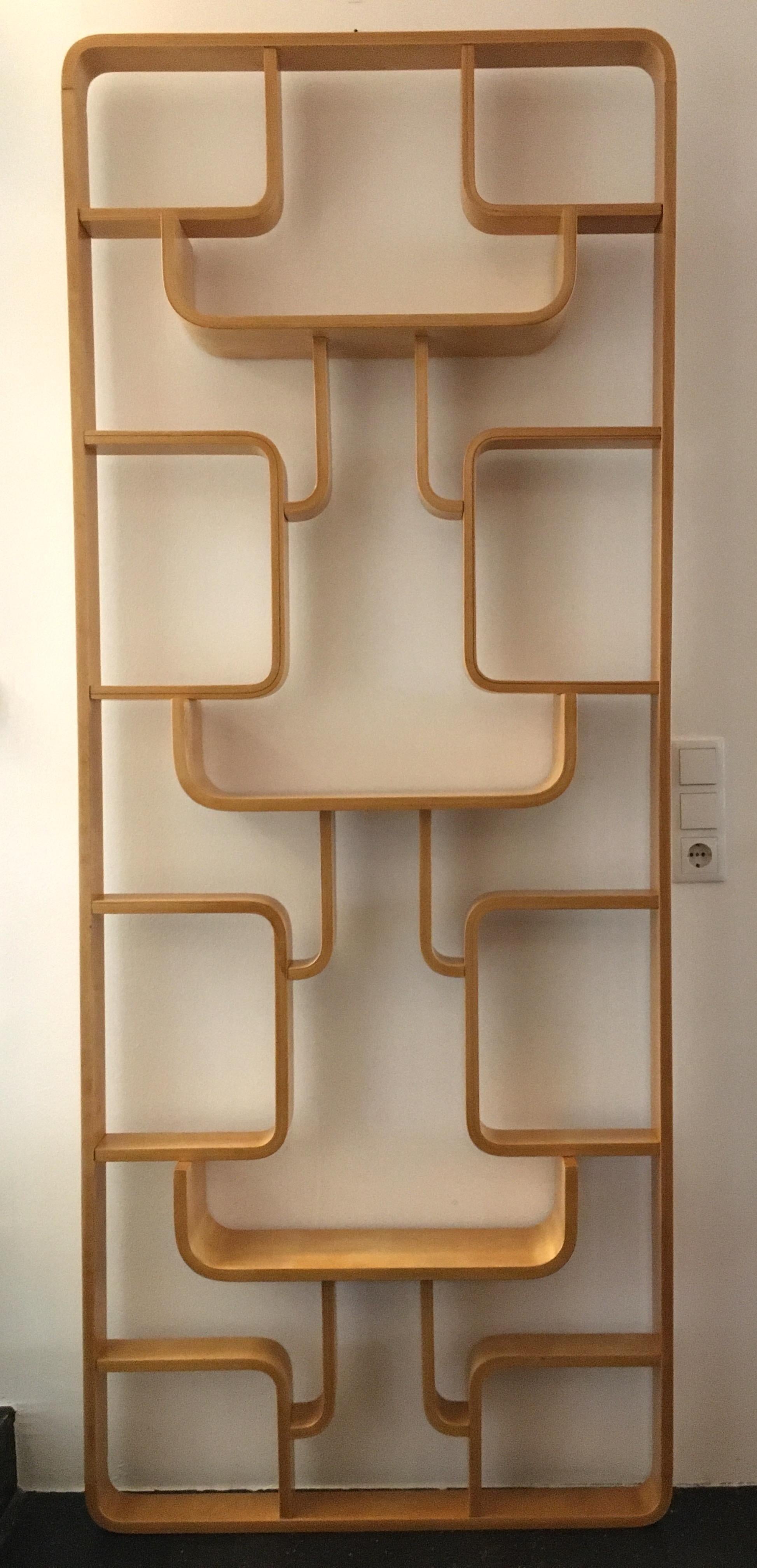 This room divider from the 1960s was designed by Ludvik Volak for Drevopodnik Holesov, in Czechoslovakia. This is made of bent beech plywood and maple veneer and with original label. Completely restored. Excellent condition. Shipping with four