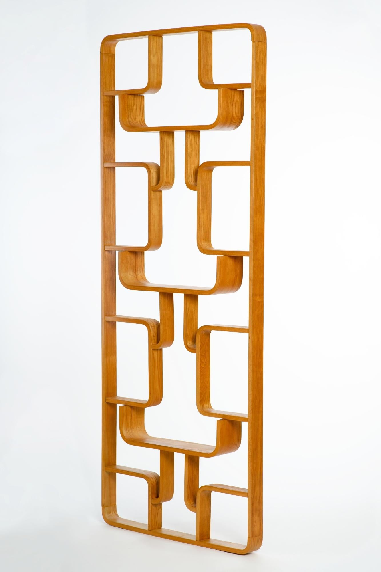 This room divider from the 1960s was designed by Ludvik Volak for Drevopodnik Holesov, in Czechoslovakia. This is made of bent beech plywood and ash veneer and with original label. Completely restored. Excellent condition. Shipping with two matching