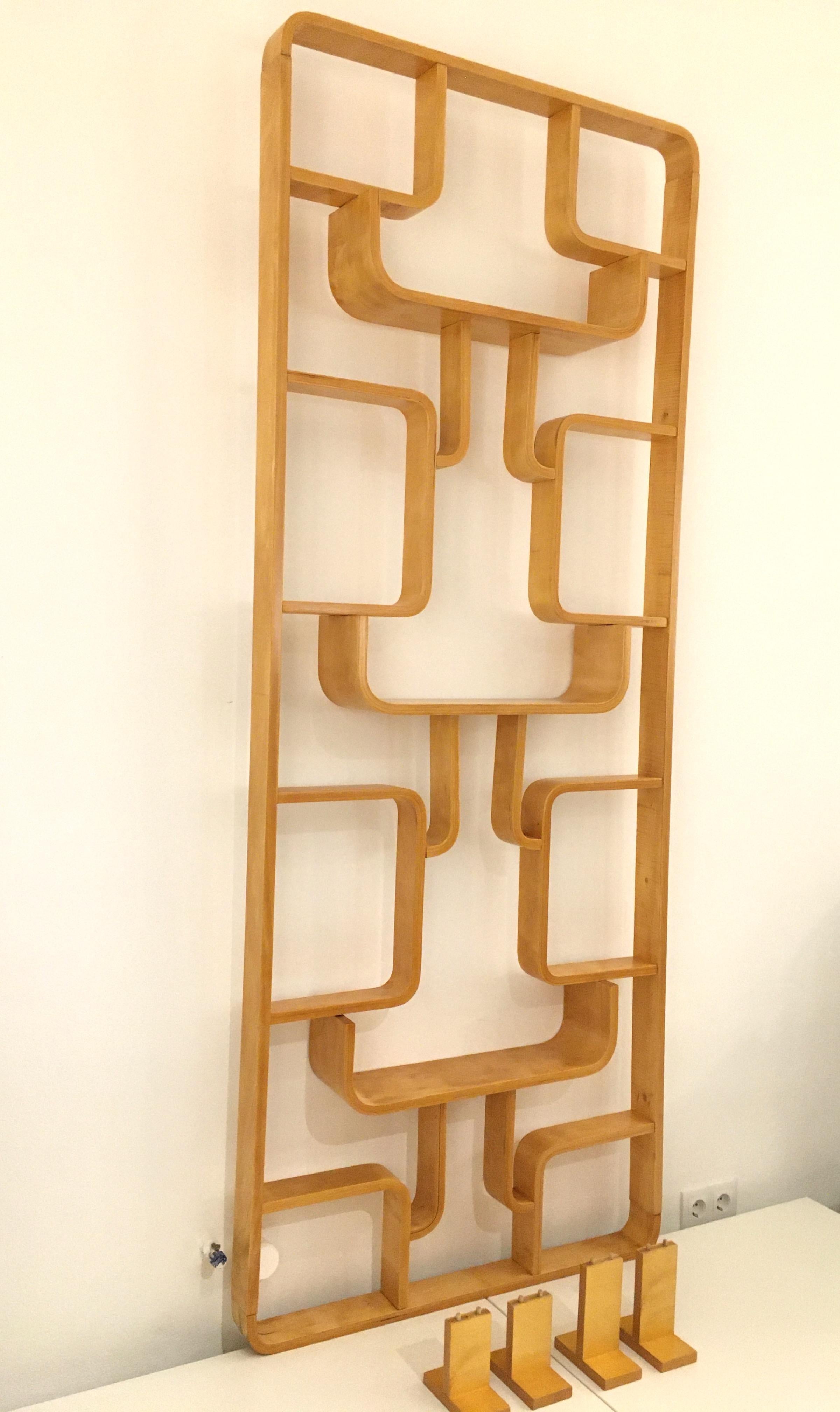 This room divider from the 1960s was designed by Ludvik Volak for Drevopodnik Holesov, in Czechoslovakia. This is made of maple veneer and with original label. Completely restored. Excellent condition. Shipping with four matching feet and in a