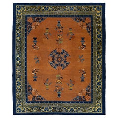 Room Size Antique Chinese Wool Rug In warm Brown With Mythical Motifs (Tapis chinois ancien en laine avec des motifs mythiques)