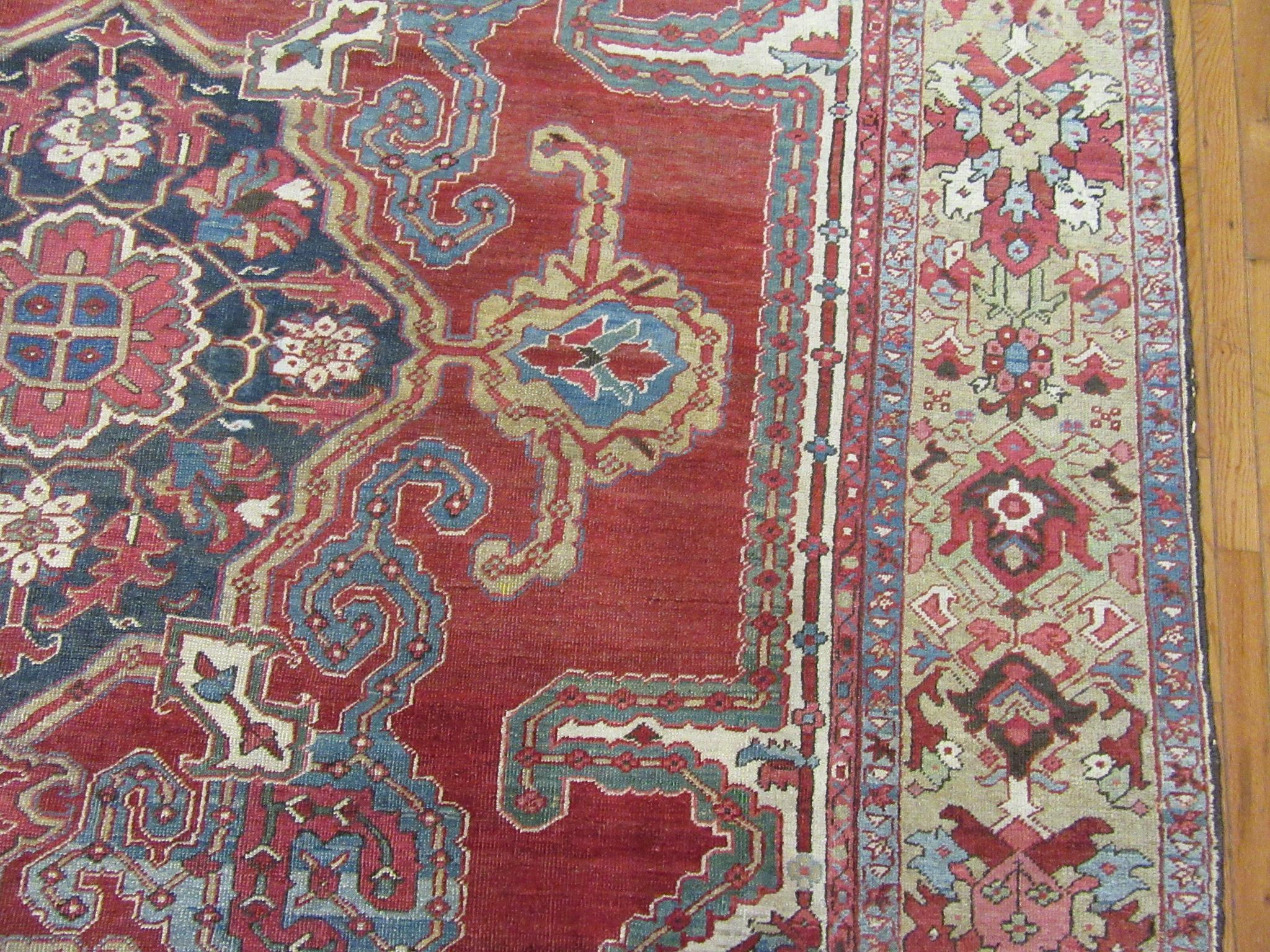 20th Century Room Size Antique Hand Knotted Wool Red Persian Heriz Rug For Sale