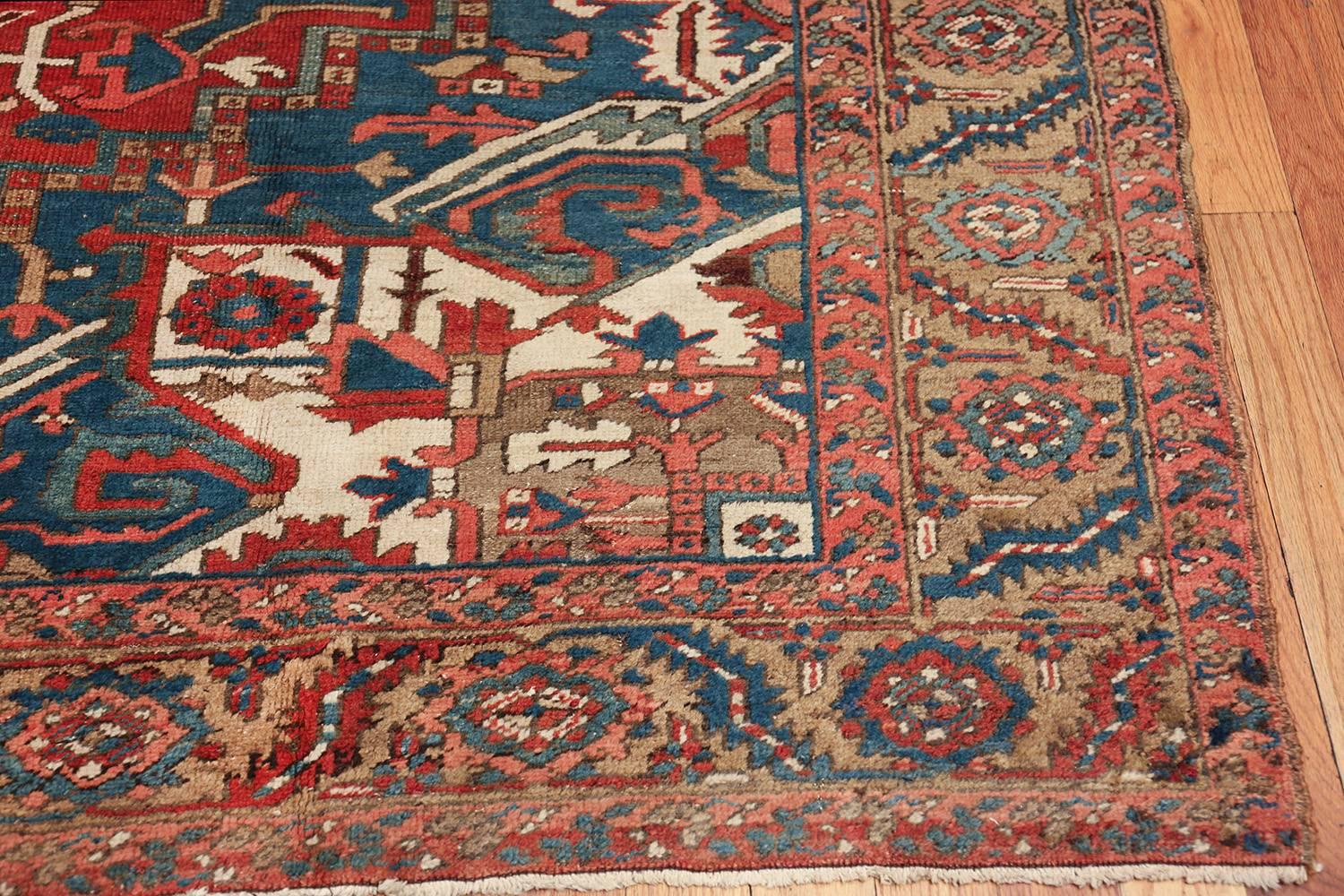 Breathtaking room size antique Persian Heriz rug, country of origin / rug type: Persian rug, circa date: 1920. Size: 10 ft x 13 ft (3.05 m x 3.96 m)

This magnificent room size antique Persian Heriz rug is a truly unique and breathtaking