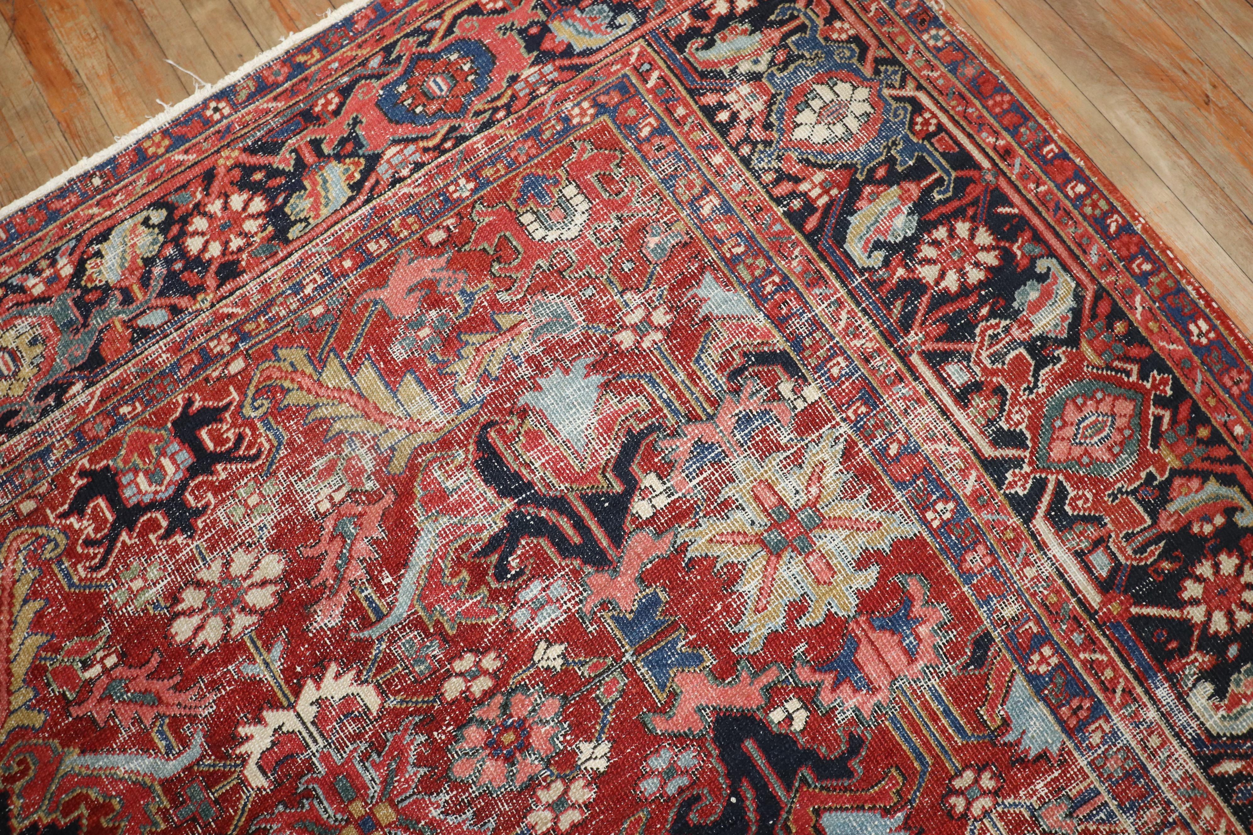 20th Century Zabihi Collection Worn Room Size Antique Persian Heriz Rug