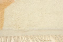 Tapis berbère marocain grandeur nature avec design en sablier sur fond blanc