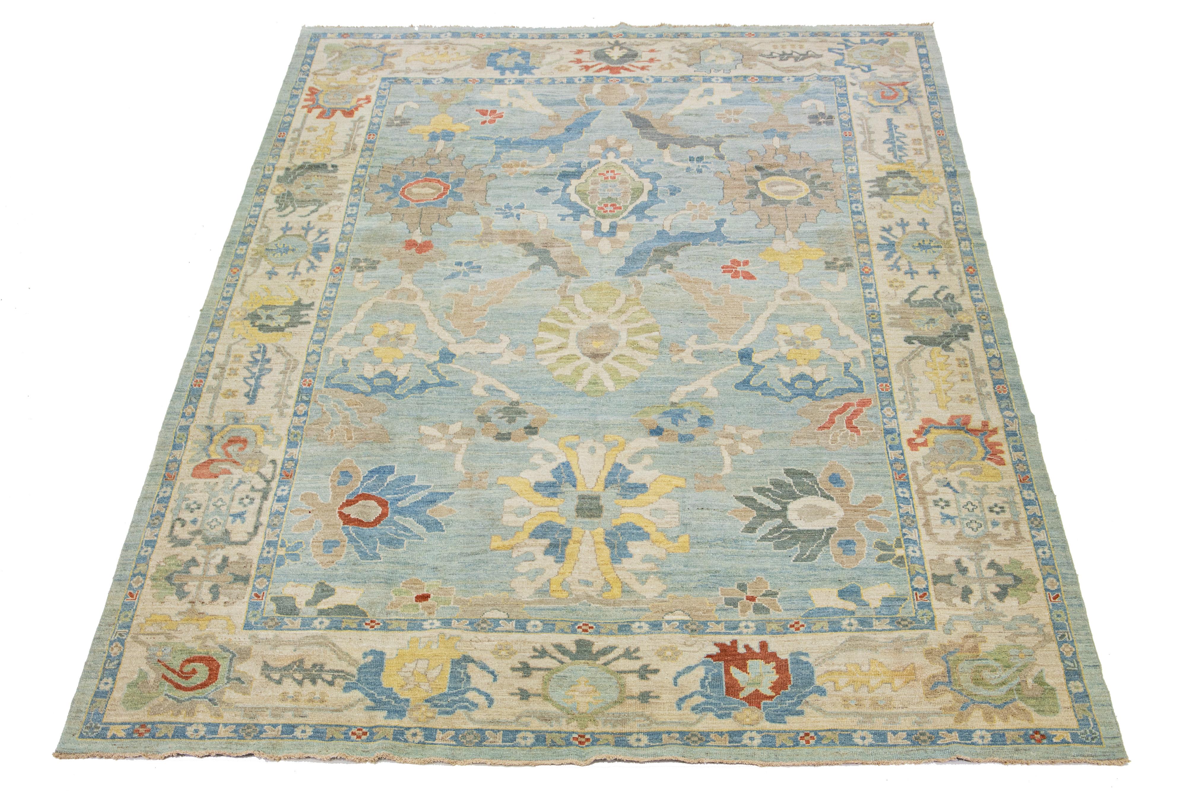 Beautiful modern Sultanabad hand-knotted wool rug with a blue field. This Sultanabad rug has a beige frame and multicolor accents in a gorgeous all-over classic floral pattern design.

This rug measures 10'2