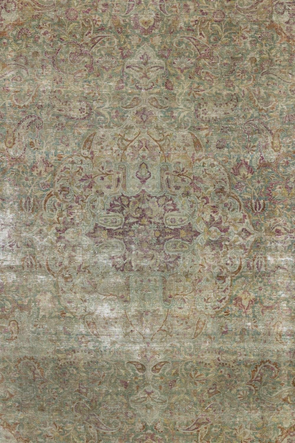 Age: Circa 1940

Colors: Wine Berry and Sand dune in a Moss field. 

Pile: Low.

Material: Wool, cotton.

Lovely silky wool in a silvery green tone with pops of wine berry. 

Vintage rugs are made by hand over the course of months,