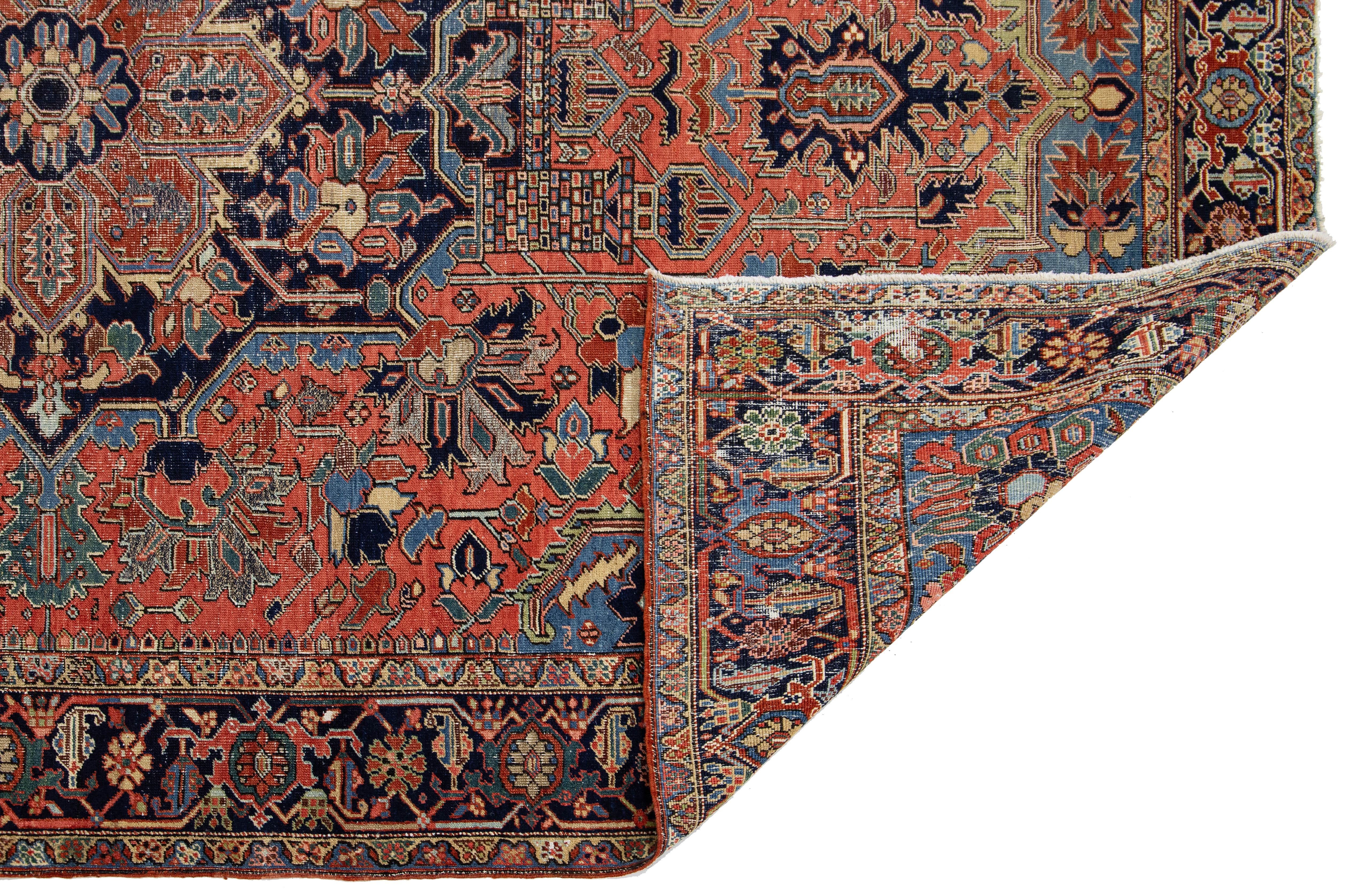 Heriz Serapi Room-Sized Antique Persian Heriz Rug in Red Wool Featuring a Medalllion Motif For Sale