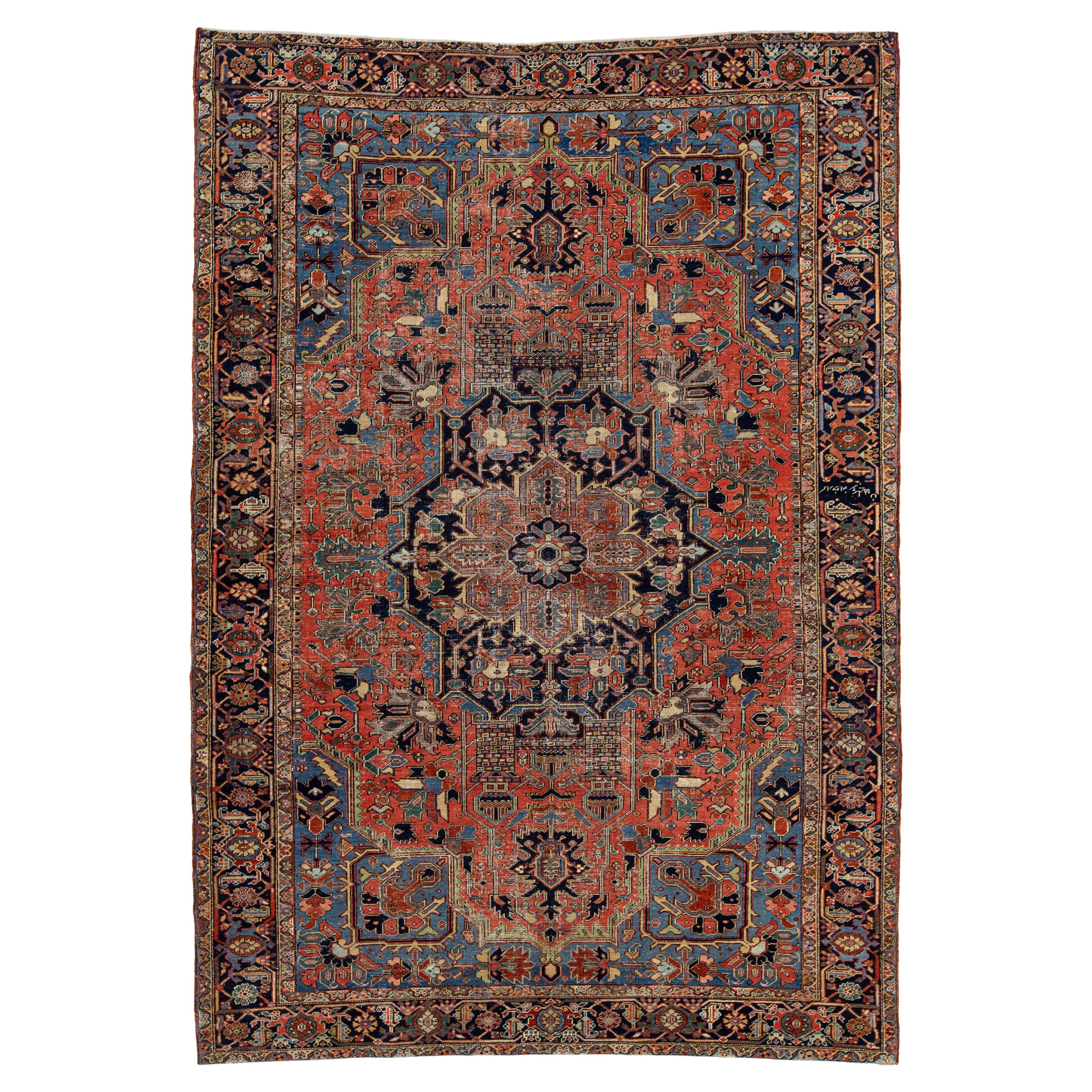 Room-Sized Antique Persian Heriz Rug in Red Wool Featuring a Medalllion Motif For Sale