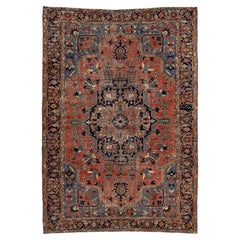 Room-Sized Antique Persian Heriz Rug in Red Wool Featuring a Medalllion Motif