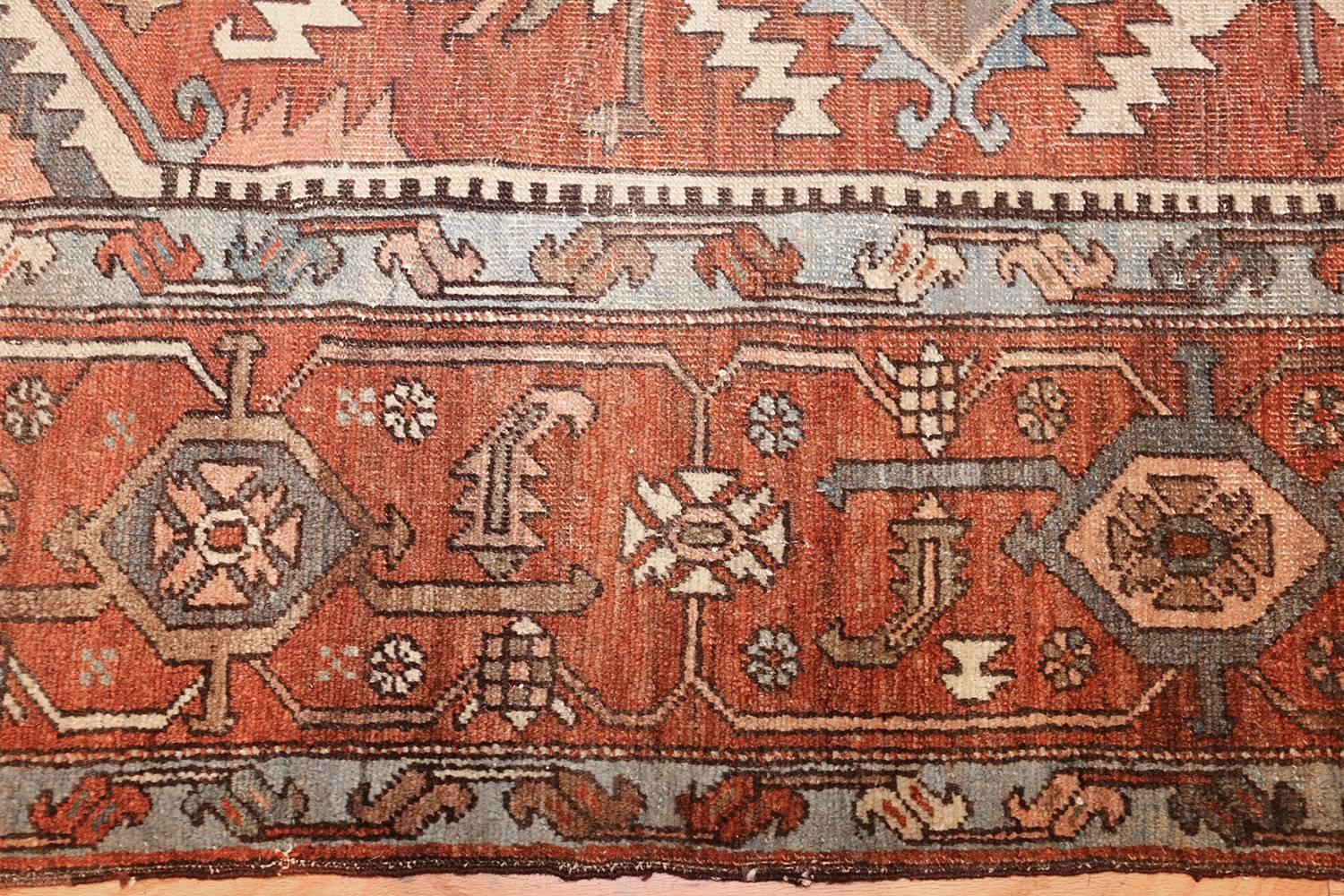 Antique Serapi Carpet, Country Of Origin: Persia, Circa Date: 1900. Size: 9 ft 9 in x 12 ft 10 in (2.97 m x 3.91 m)

Woven in northwestern Iran, this bold Serapi rug boasts masterful artistry, clarity of design, and stunningly lovely symmetry that