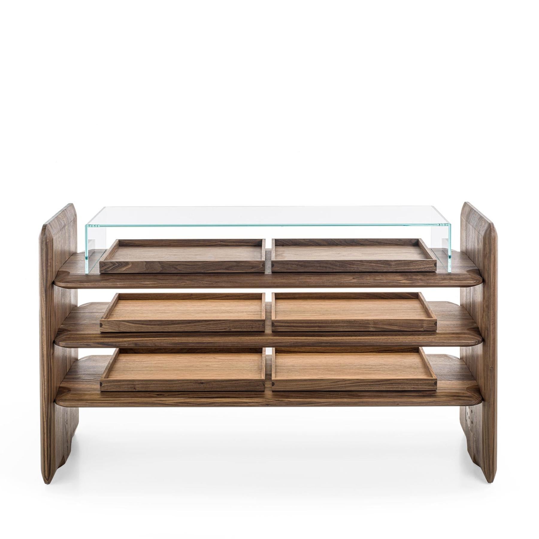 Console Table Room Walnut, storage console with all structure
in solid walnut with 3 shelves that intersect with the side panels 
through exposed joints. With 6 compartments assembled with 
dovetail joints, 2 compartments per shelf, with wood on