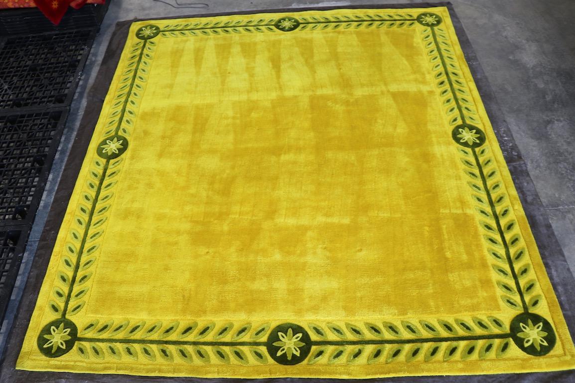 V'Soske carpet hand tufted in wool, having an open field with floral border. Thick plush pile, elegant, chic and sophisticated. This example is in very good condition, newly professionally cleaned and treated, ready to install and enjoy.
The rug