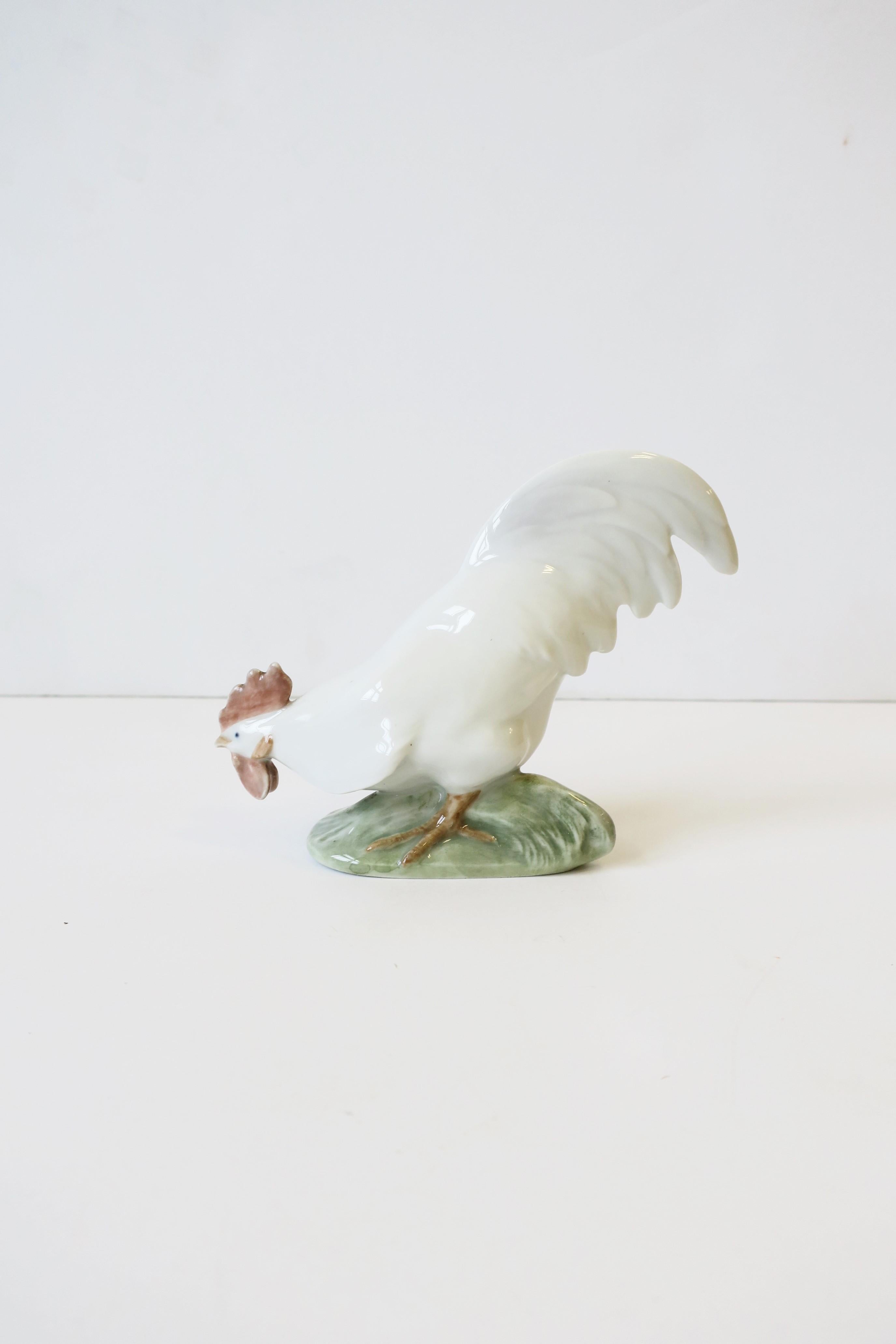 A porcelain rooster bird by Royal Copenhagen, Denmark, circa 20th century. With makers' mark and numbered on bottom as show in image #15. Dimensions: 1.5