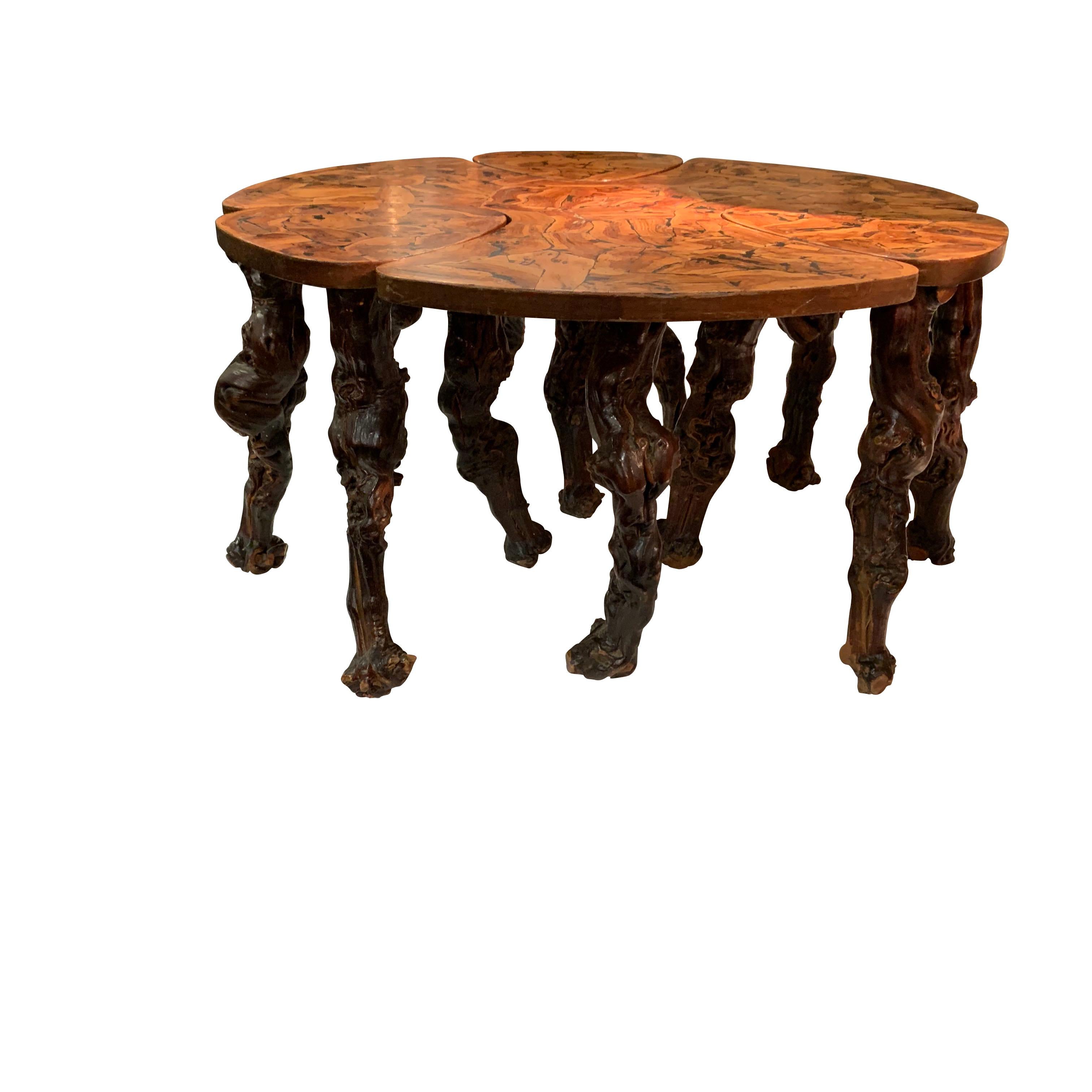 20th century French very unique and unusual coffee table with three pull out sections that can be used as either cocktail tables or could be used as stools.
Freeform legs
Table is made from French vines
Beautiful natural patina
Measurement is