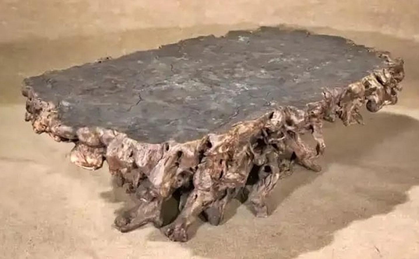 Large teak wood root coffee table. Over five feet long, this heavy table can be used inside or in your garden.
Please confirm location NY or NJ