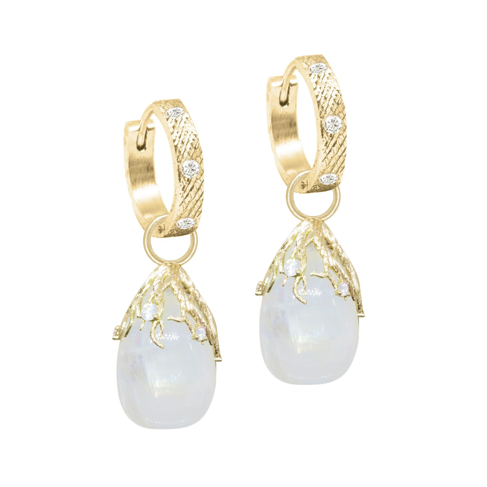 With rich, regal Moonstone, our Rooted Gold Earring Charms make the perfect addition to any hoops or charms.
Nina Nguyen Design's patent-pending earrings have an element on the back of the stud or charm to allow these pieces to transformed into