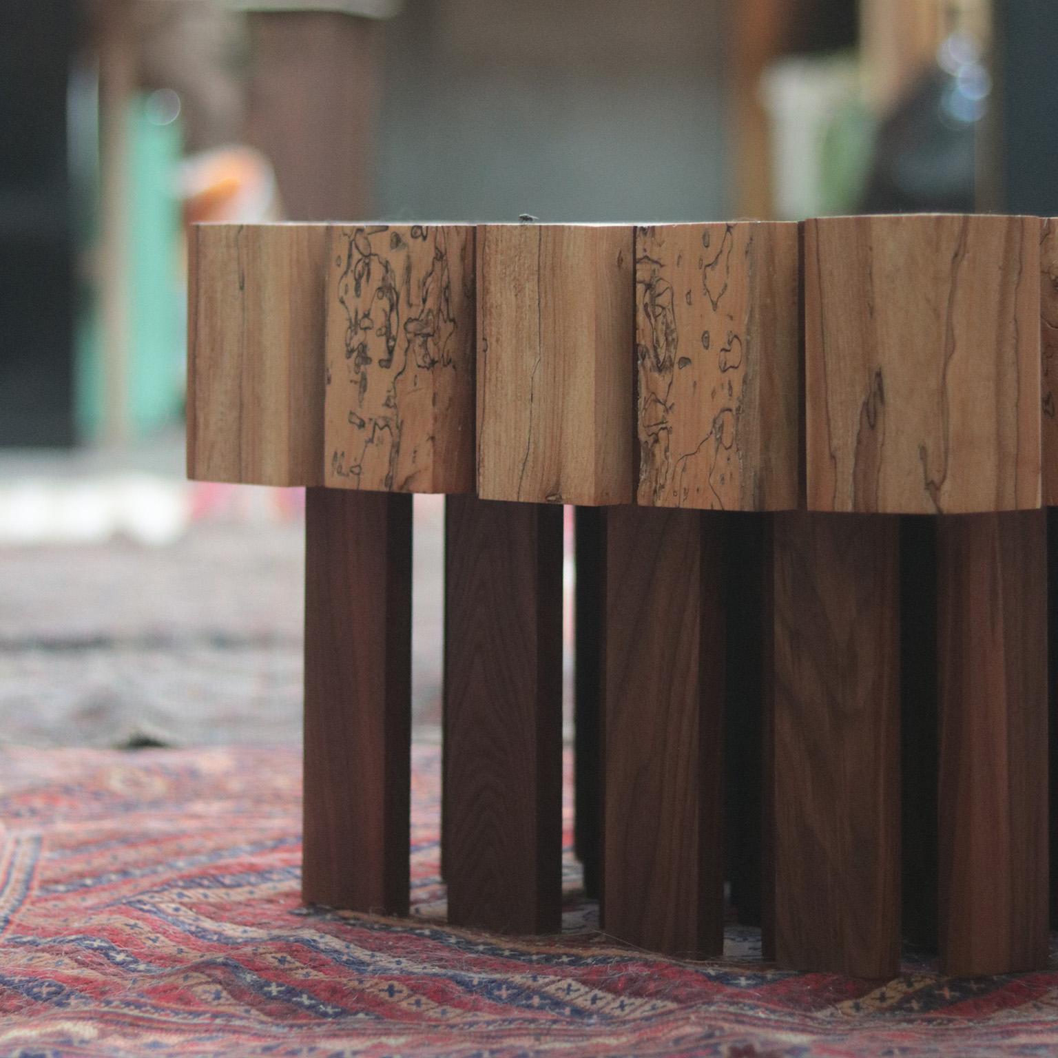 The Rooted side table is a smaller variation based on our larger coffee table design.  As in the larger table this iteration is entirely hand made from spalted maple and walnut. We use dado joints,
joining woods in a way that marries strength and