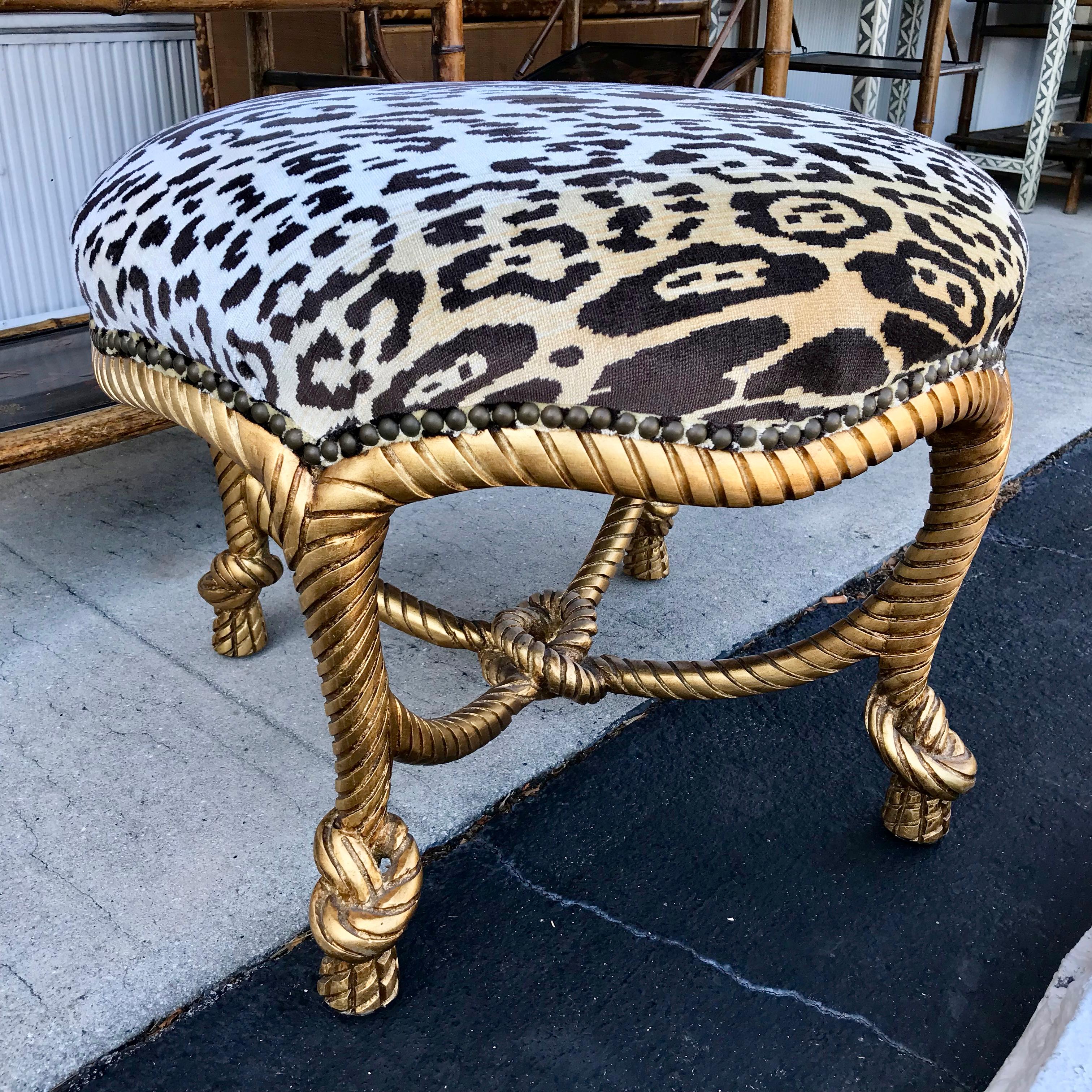 A beautifully and richly gilded bench. Outstanding style and proportions.
The bench is appointed with fabulous faux leopard seat covering.