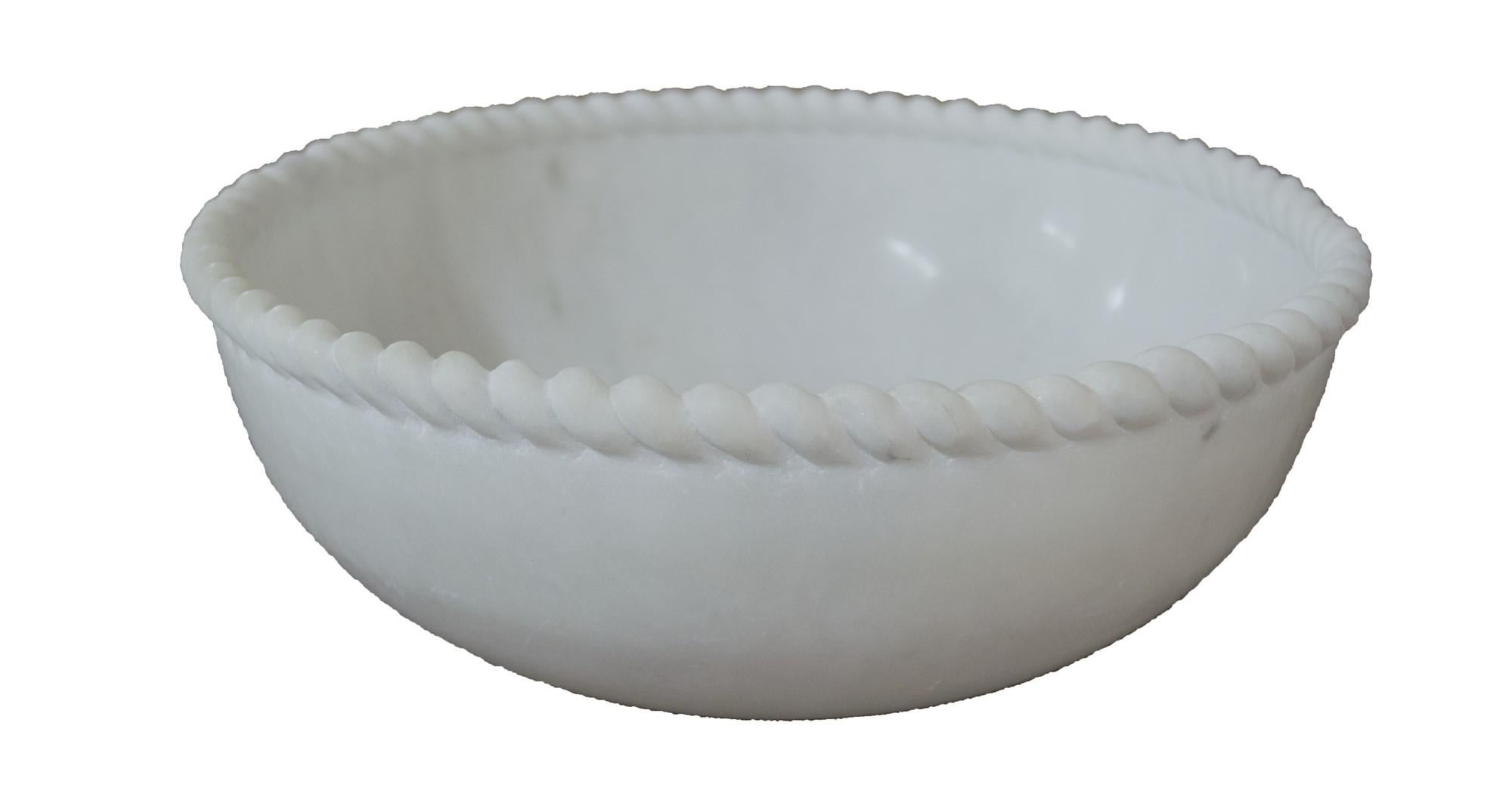 Sculpted out of a single block of marble with a delicately carved rope edge, perfect for a potpourri, a fruit bowl or just a key catch.


Round Rope Bowl in White Marble
Size- 8.5” x 8.5” x 3.5” H.
Materials - White Marble, Hand-Carved


Buyer