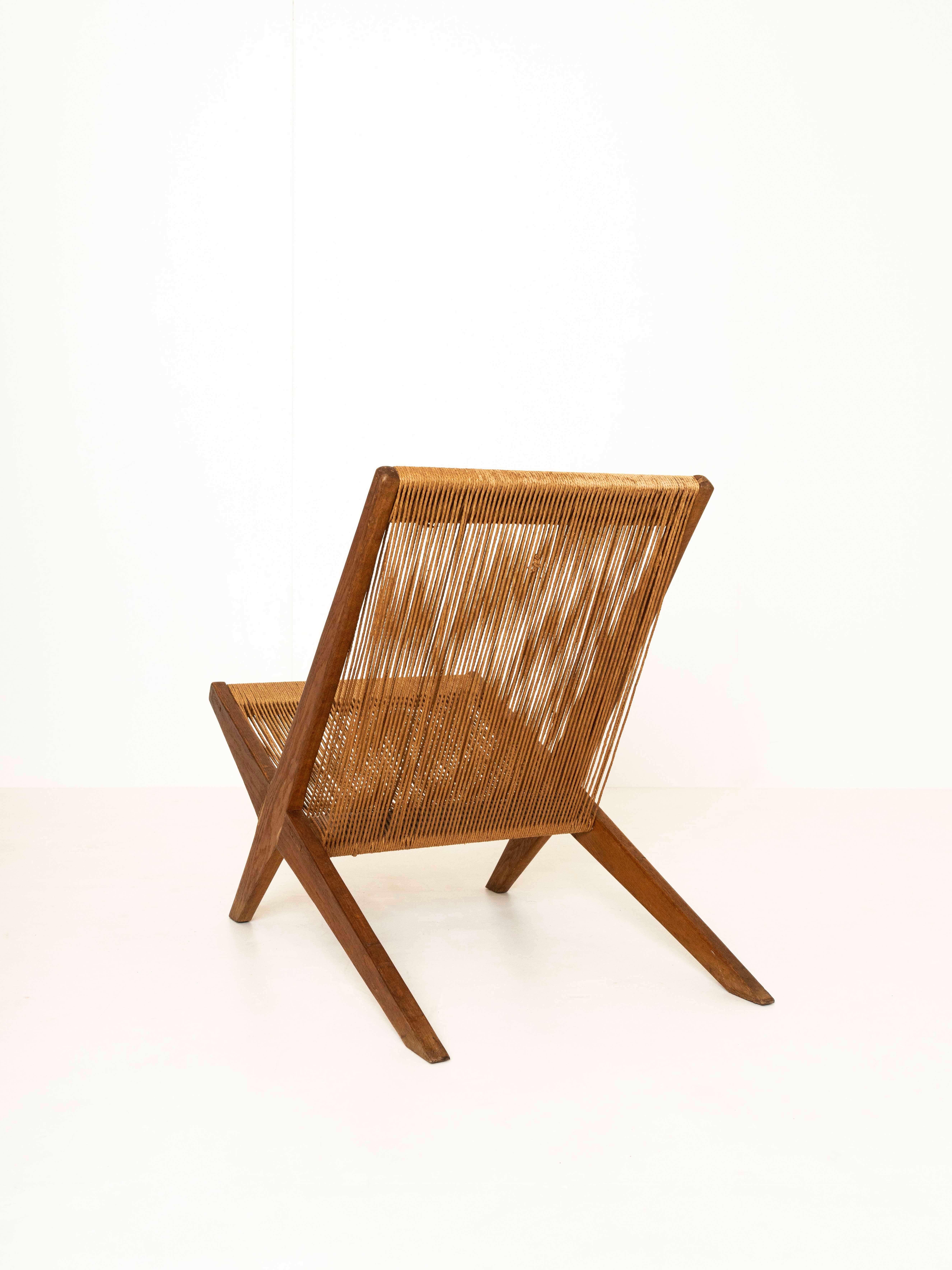 Impressive 'rope chair' attributed to Poul Kjaerholm and Jørgen Høj, Denmark 1960s. This chair is such an artistic item, it is almost more art than a piece of furniture. The chair is made of stained pine wood and rope pine. This exceptional chair is