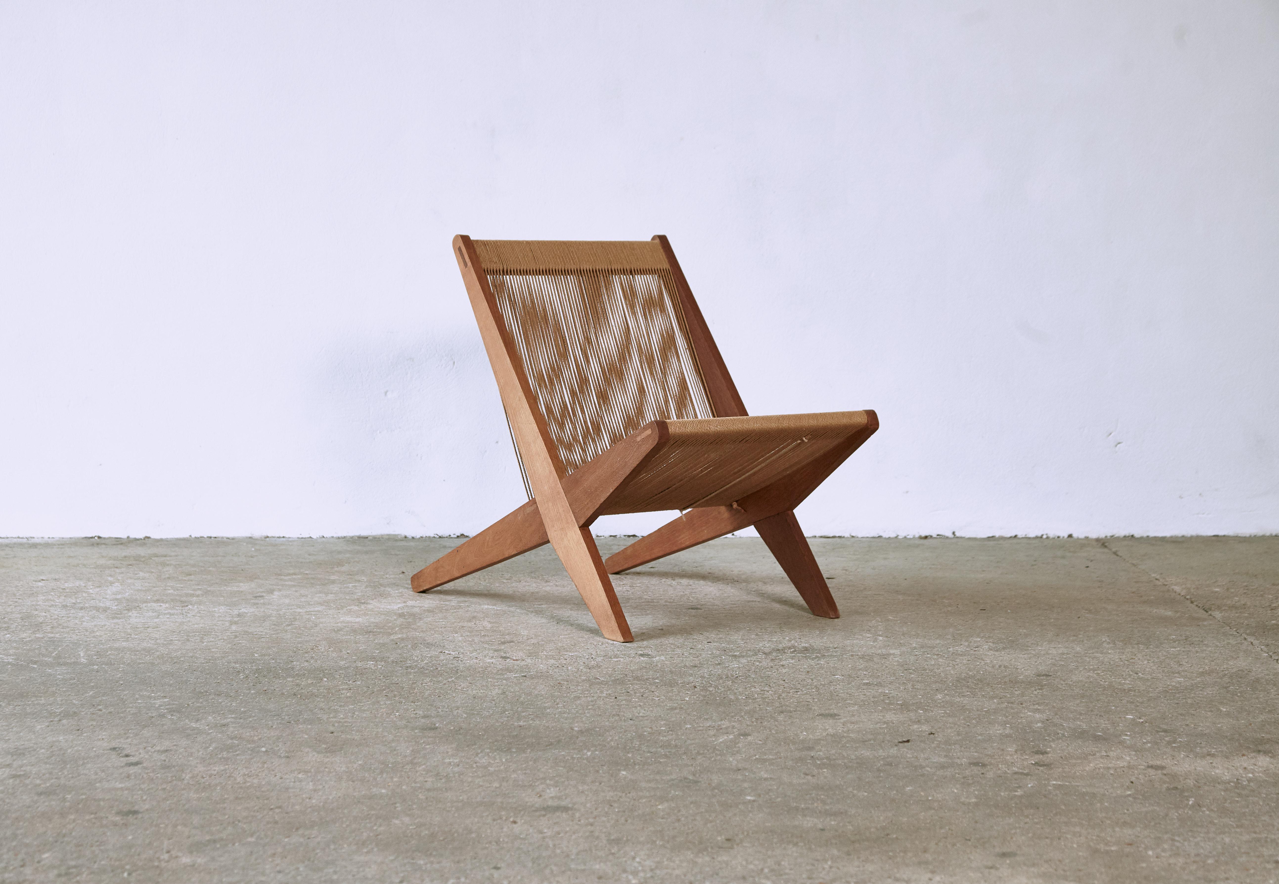 Wood and rope chair attributed to Poul Kjaerholm & Jørgen Høj for Thorald Madsen Snedkeri, Denmark, circa 1960s. In good original condition.   Fast shipping worldwide.


