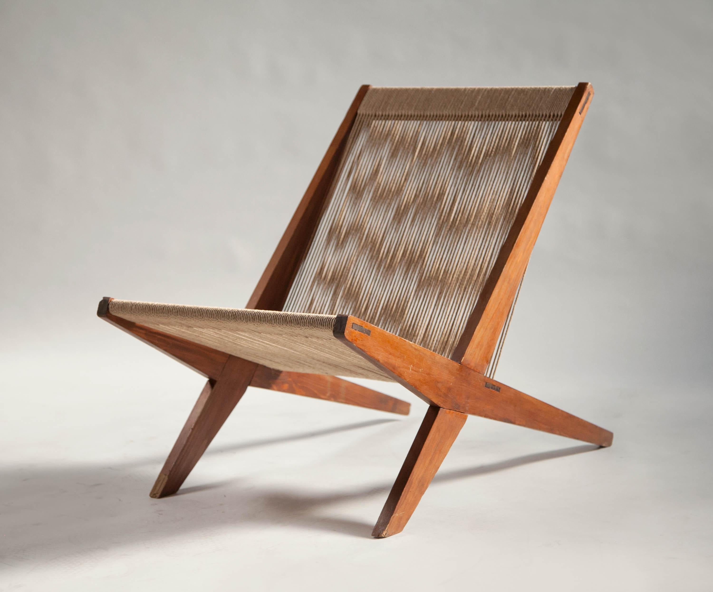 Rope chair in pine - attributed to Poul Kjaerholm & Jørgen Høj, Denmark 1960's 

Made of stained pine wood and rope pine this curious piece is often attributed to Poul Kjærholm & Jørgen Høj for Thorald Madsen Snedkeri. Though not confirmed it is