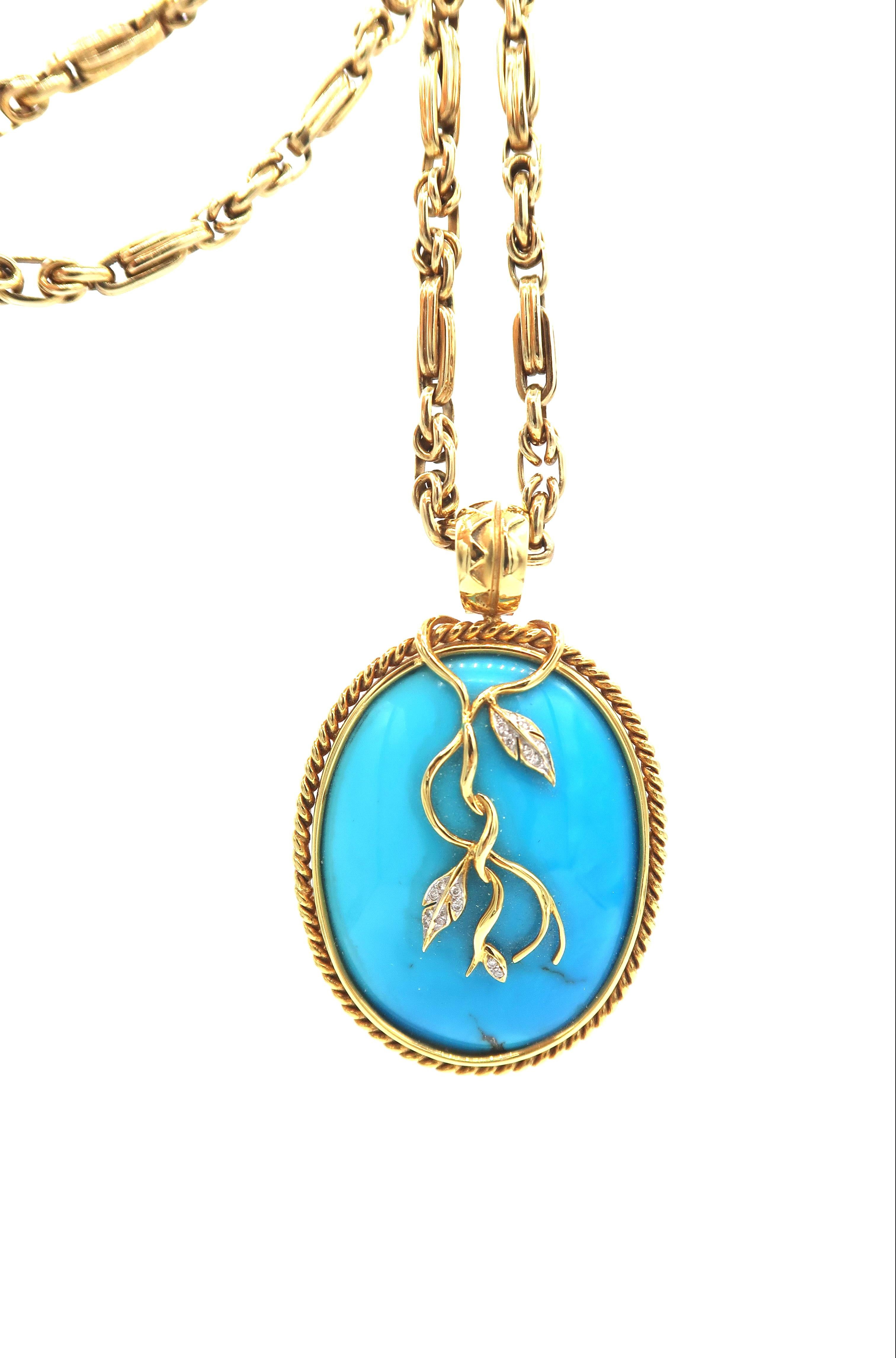 Rope Detail Openable Pendant in 18K Yellow Gold with Cabochon Turquoise and Diamond Vine
Diamond: 0.2ct.
Turquoise: 128.51cts.
Gold: 18K Gold 29.50g.

and 

18K Yellow Gold Link Chain
Gold: 18K Gold 57.50g.