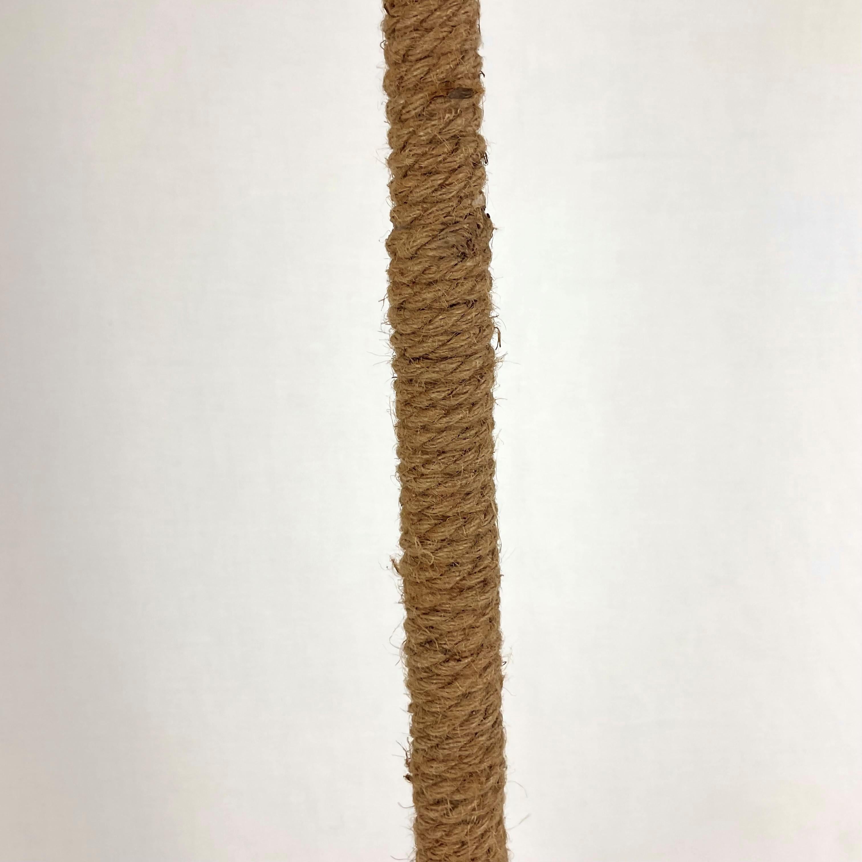 This is a one-of-a-kind natural rope-covered floor lamp with a grasscloth shade and rope pull. It has all new wires, a pull chain socket, and a step-floor on and off button. It's a super cool style for any modern or coastal room, and it's of very