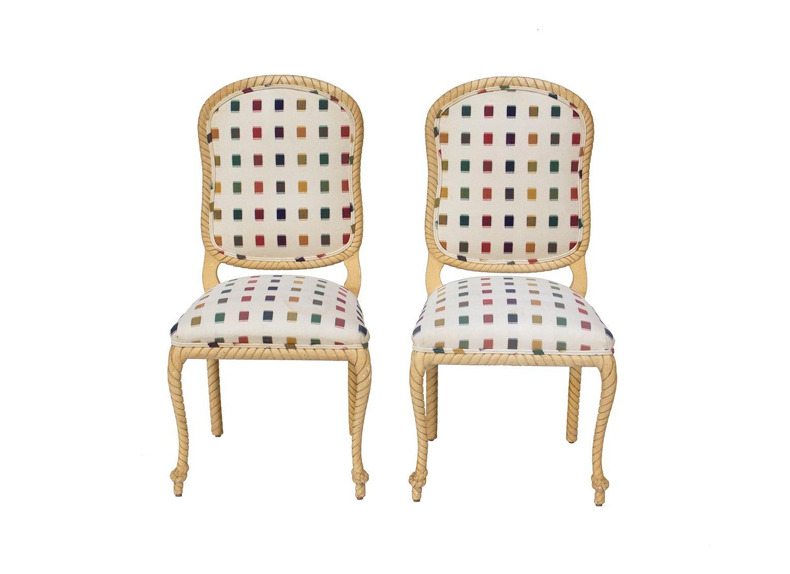 USA, 1980s
Pair of faux rope frame dining chairs custom made for Holland Salley, Inc of Naples, Florida. Fun square patterned fabric- use as is or reupholster. Coastal faux rope frames with twist details.
DIMENSIONS: 19
