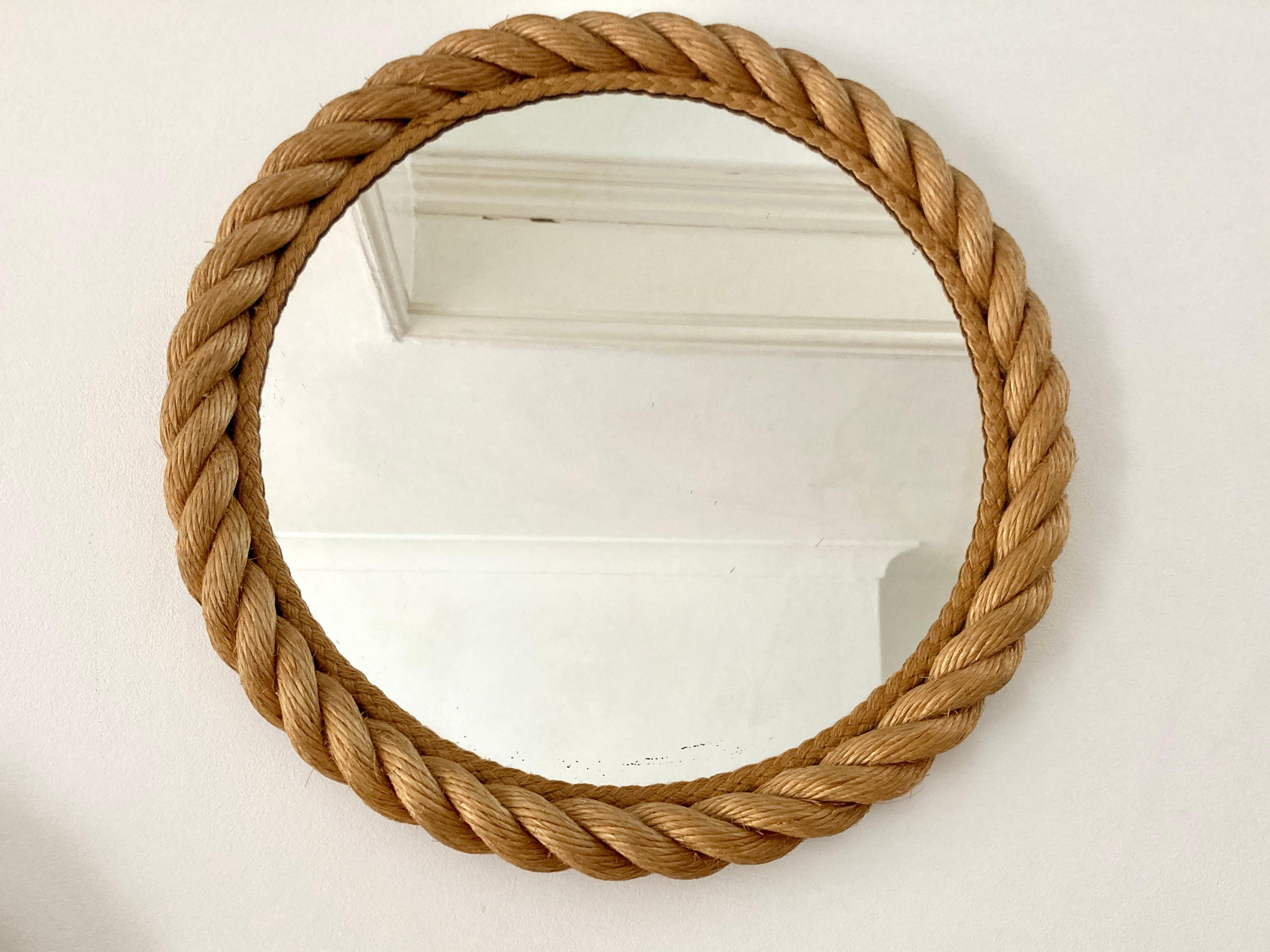A good size (45 cm diameter) rope frame mirror by Adrien Audoux and Frida Minet, France, circa 1950-1960.

Very good original condition, nice colour to the rope, very clean with no damage.

Slight age related foxing to the bottom of the glass,