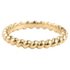 Anillo de cuerda, talla 6, 3 gramos de oro de 18 quilates, por Michelle Massoura