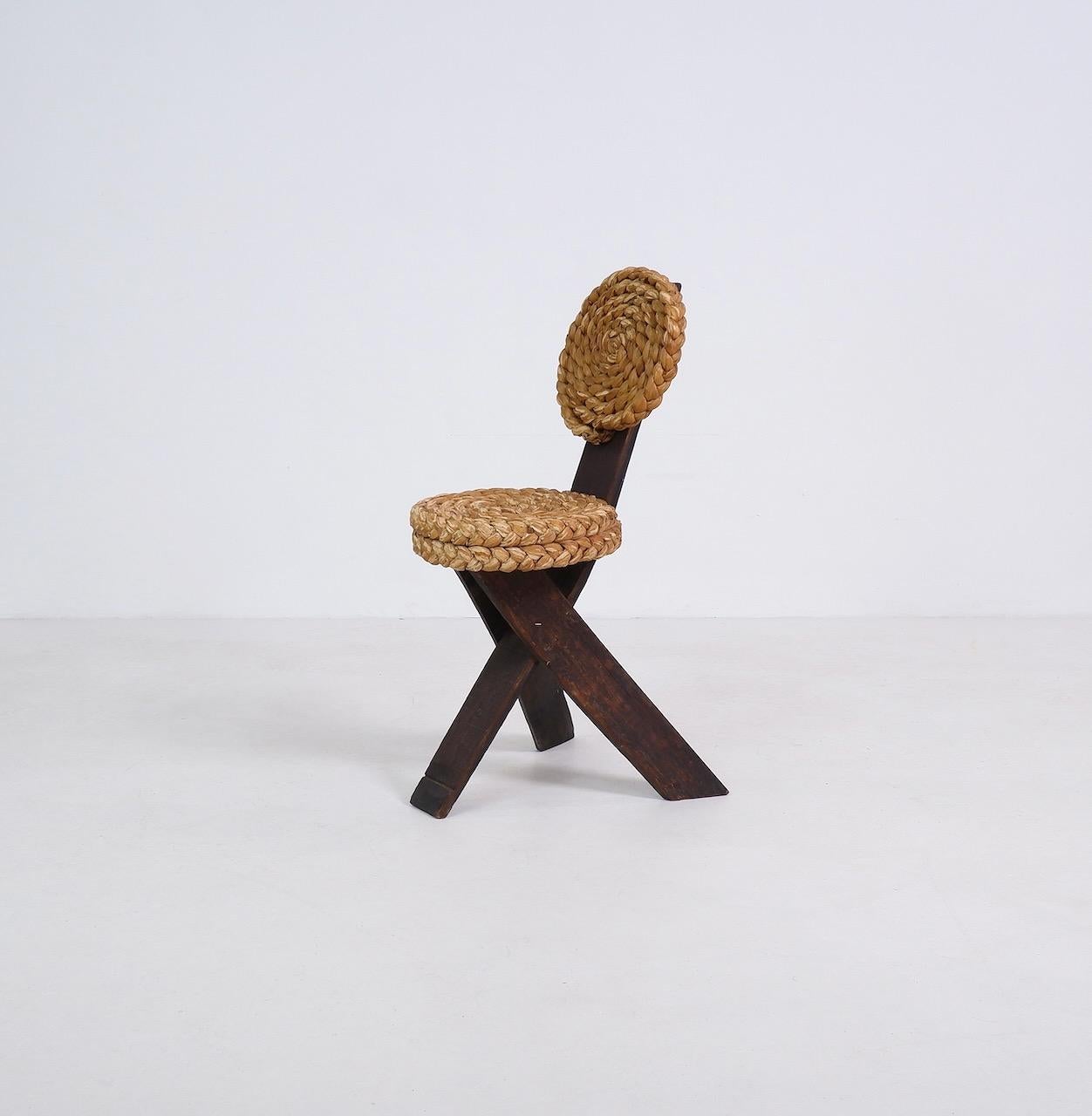 A primitive wood and braided rope side chair designed by Adrien Audoux and Frida Minet, the French designers famed for their inventive use of accessible materials. 

Dimensions (cm, approx): 
Height: 80
Width: 37
Depth: 50
Height to seat: 47