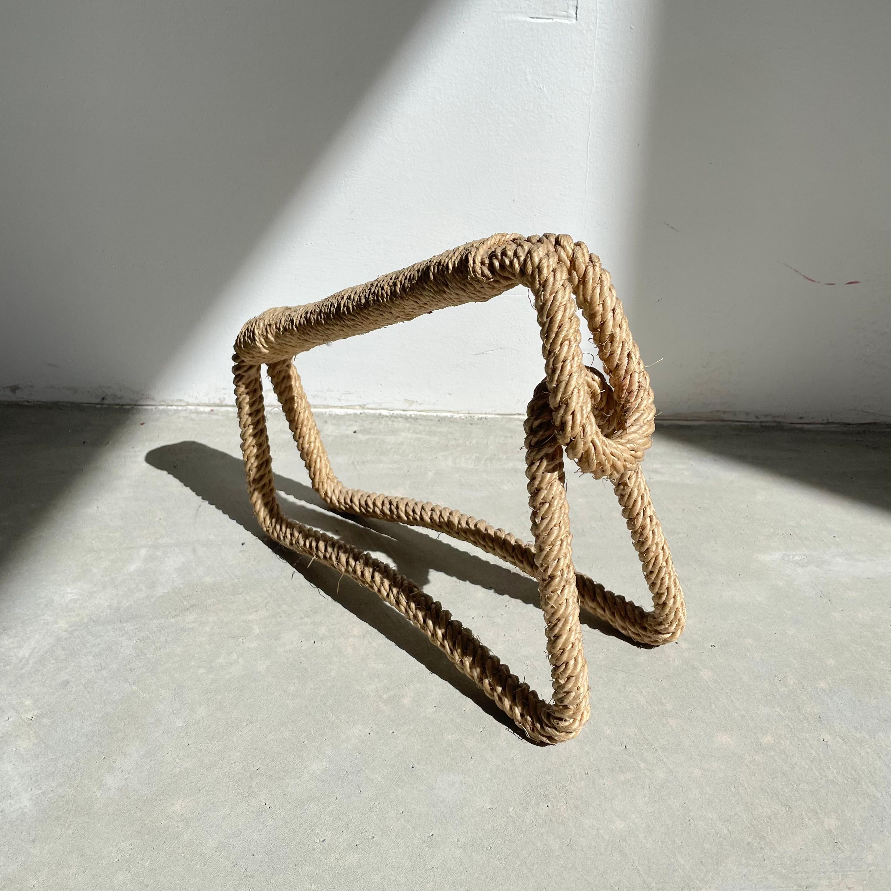 Unique rope wine bottle holder/carrier by French-Swiss husband-and-wife duo Audoux and Minet from France circa 1960.

Known for their playful and unique modernist designs, Audoux and Minet adopted a rustic style in their work, integrating Abaca hemp