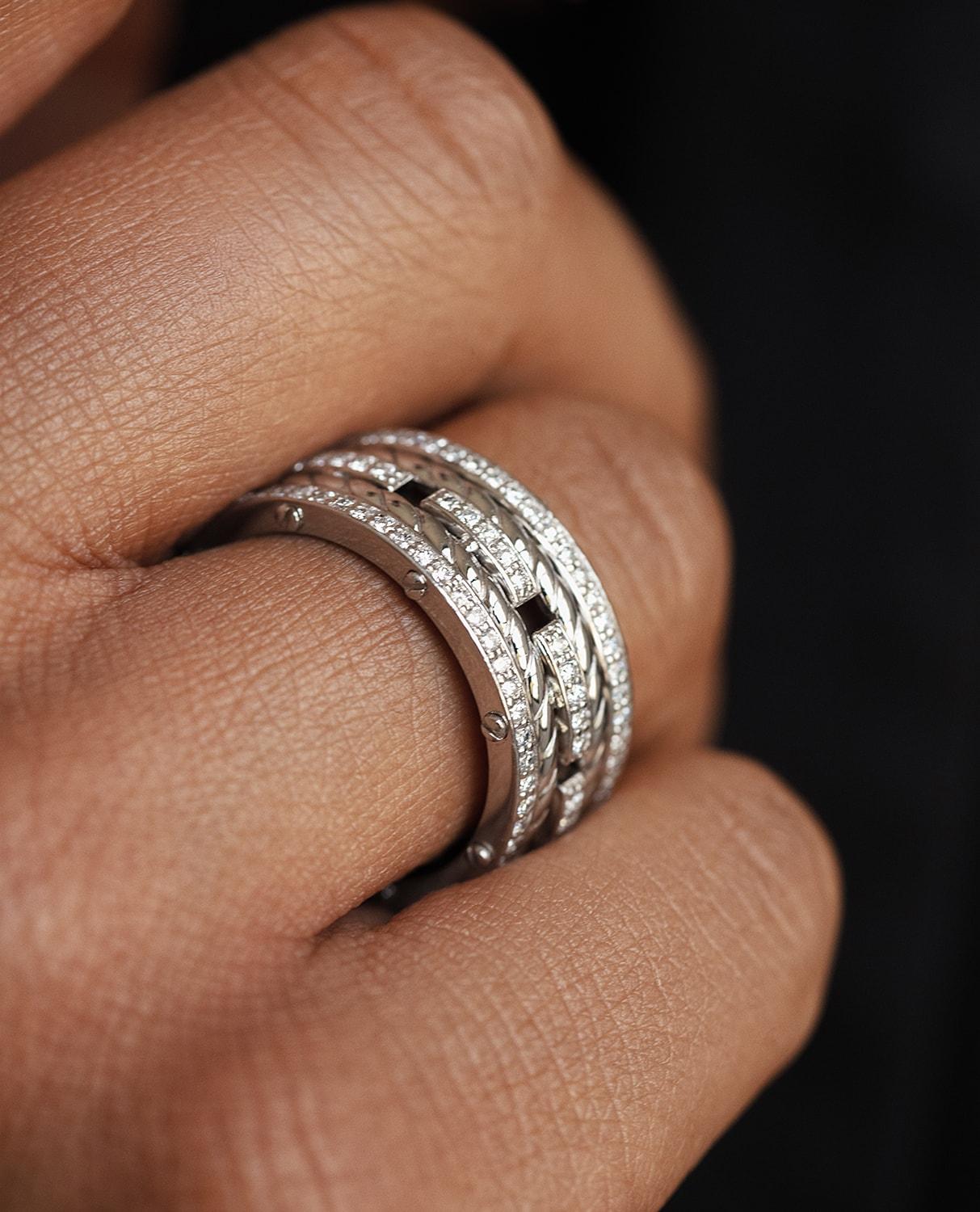Three bold-looking rings, pave set with 1.45ct brilliant cut round white diamonds, connected by the signature exclusive Rockford screws with rope designs flowing in between the bands. Our ROPES ring has a very modern, striking look with a special