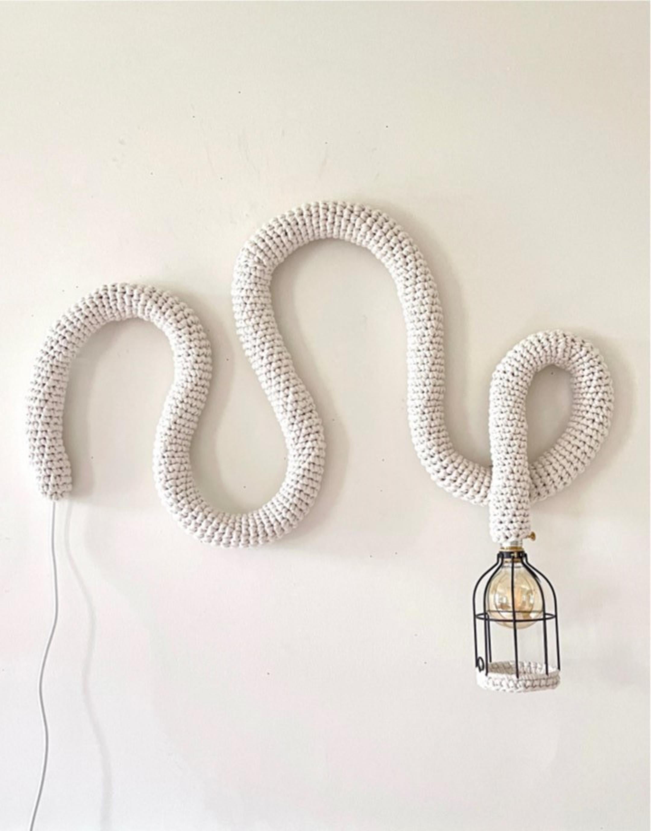 Ropes No. 7 Wall Sculpture by Meg Morrison
Dimensions: W 97 x D 10 x H 79 cm (approximate measurements)
Materials: Yarn, other

The yarn used in my ropes is reclaimed from textile mill remnants. All pieces are hand stitched from sustainable